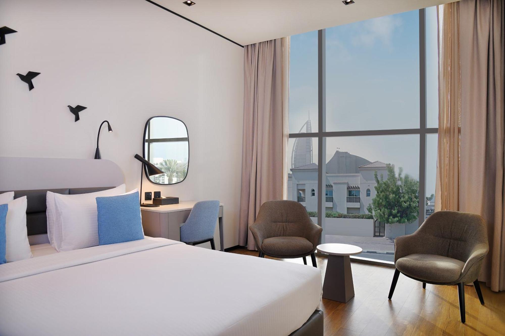 Deluxe Zimmer mit Queensize-Bett/2 Einzelbetten