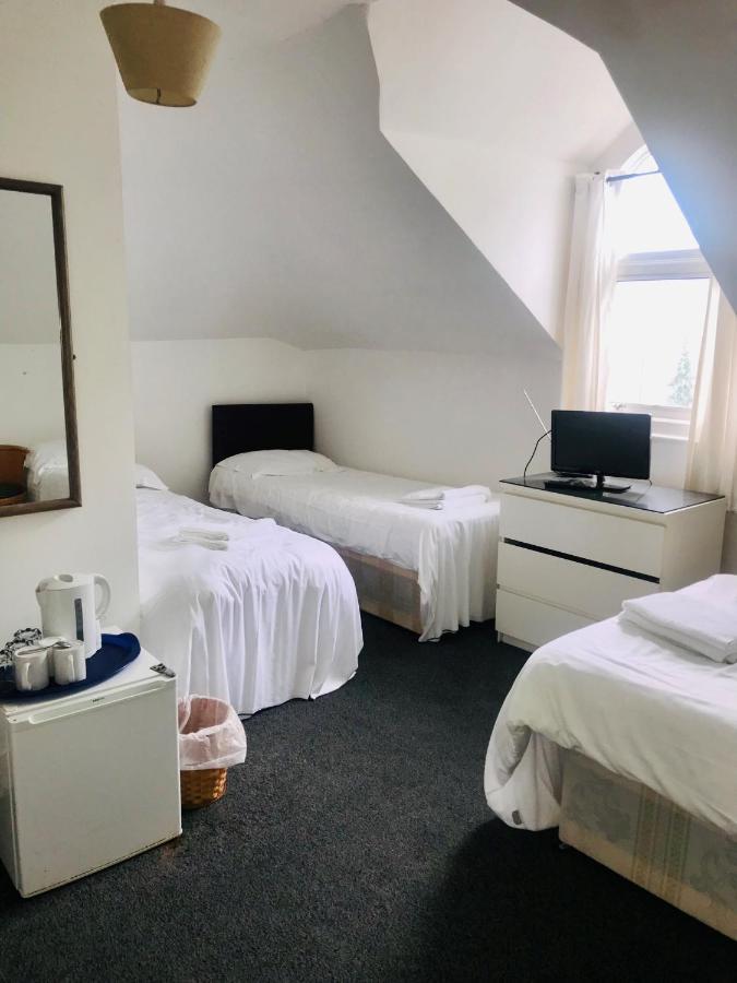 Basic Dreibettzimmer mit Gemeinschaftsbad