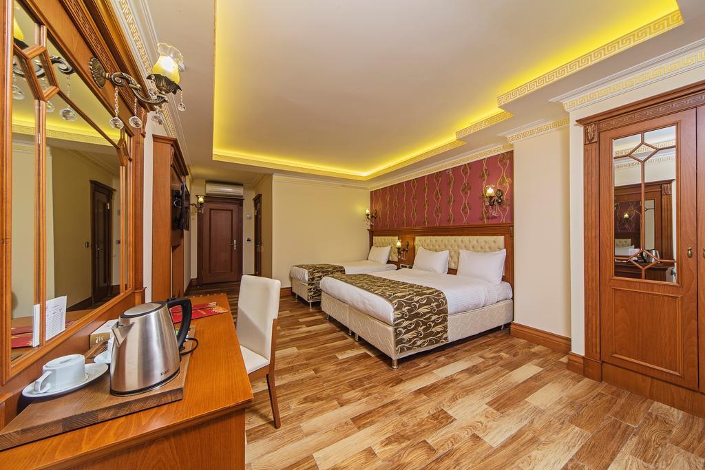 Deluxe Dreibettzimmer