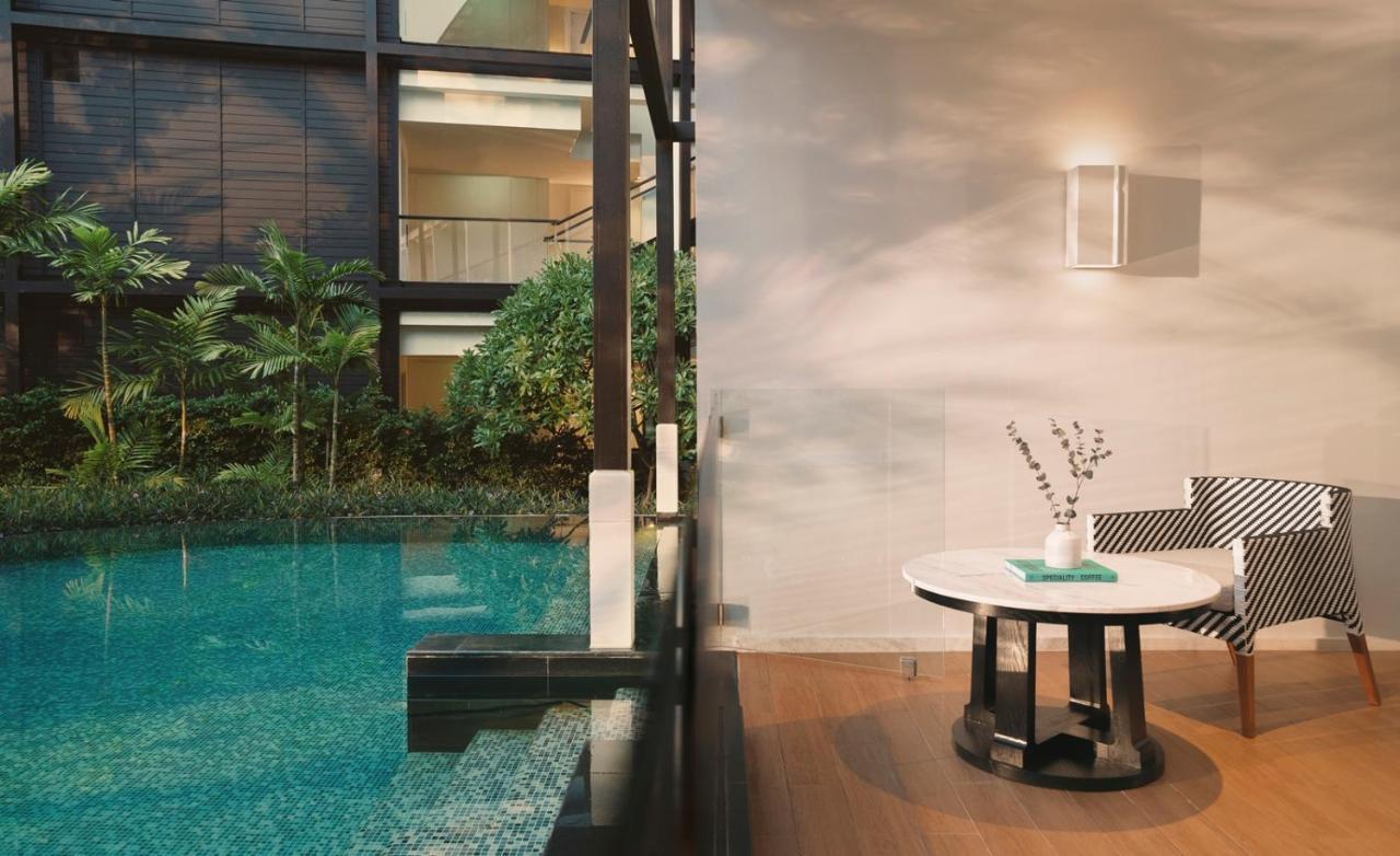 Essential Zweibettzimmer mit Aussicht auf das Resort und Zugang zum Pool