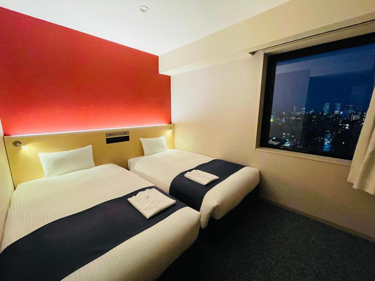 Zweibettzimmer mit Stadtblick