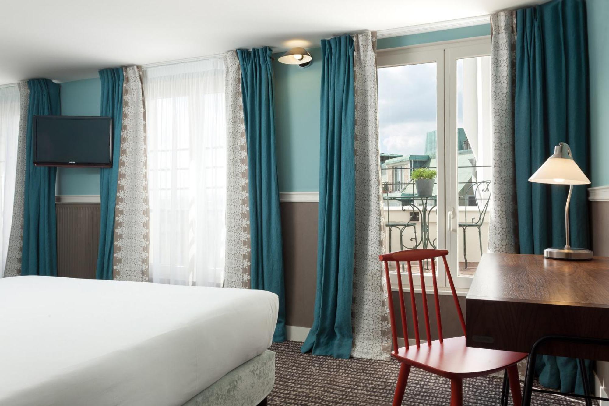 Deluxe Zimmer mit Balkon und Blick auf die Dachterrasse