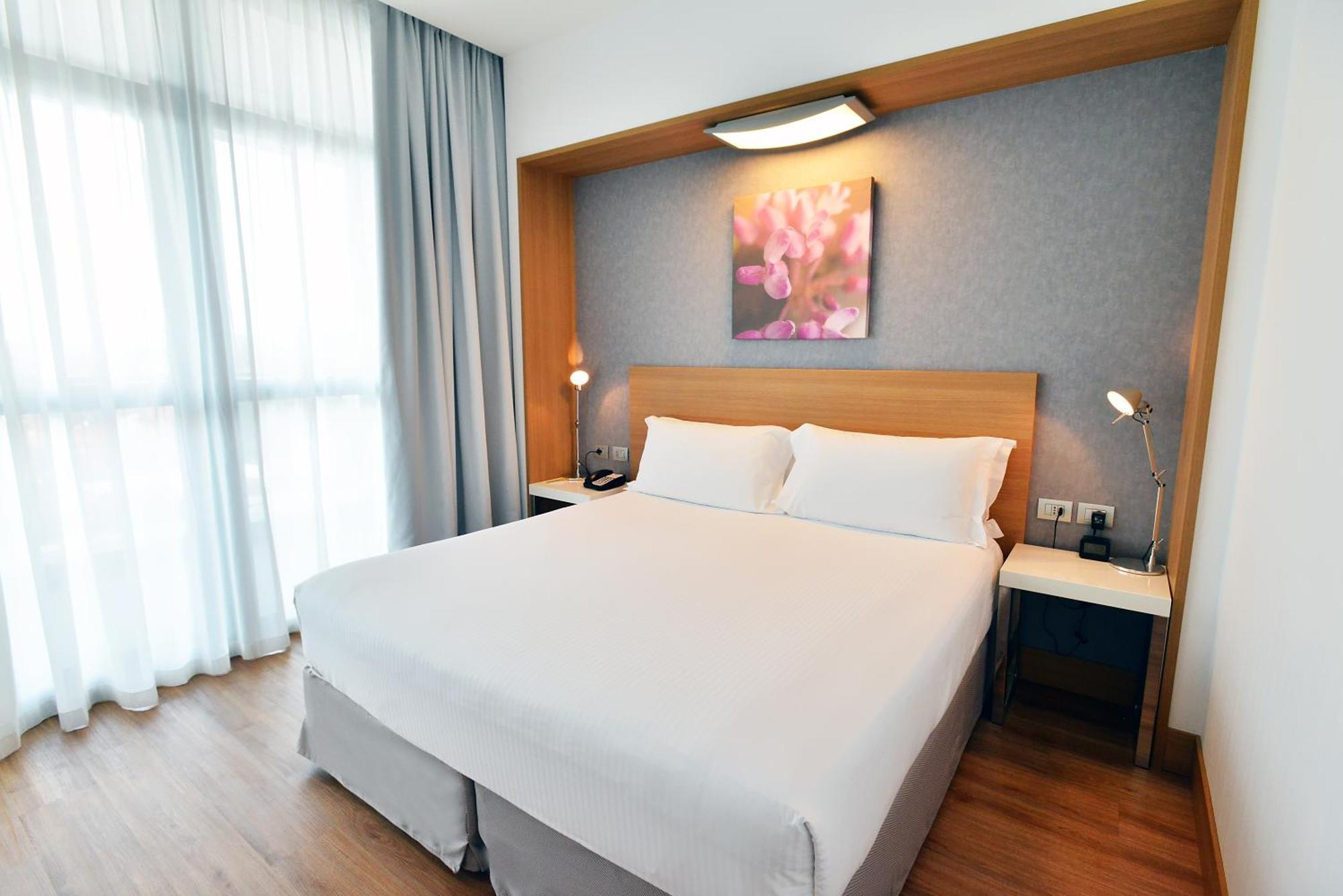 Deluxe Zimmer mit Kingsize-Bett