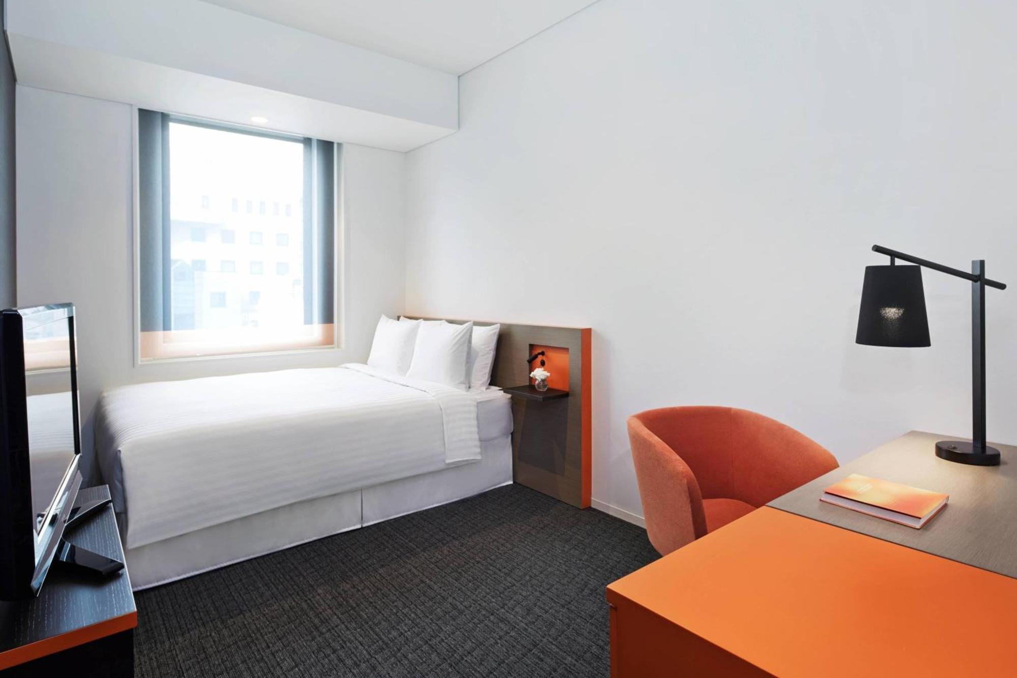 Zimmer Creators mit Queensize-Bett