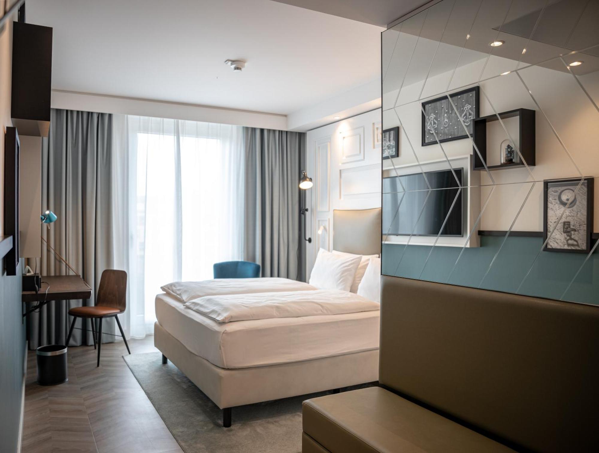 Premium Zimmer mit Queensize-Bett und Stadtblick