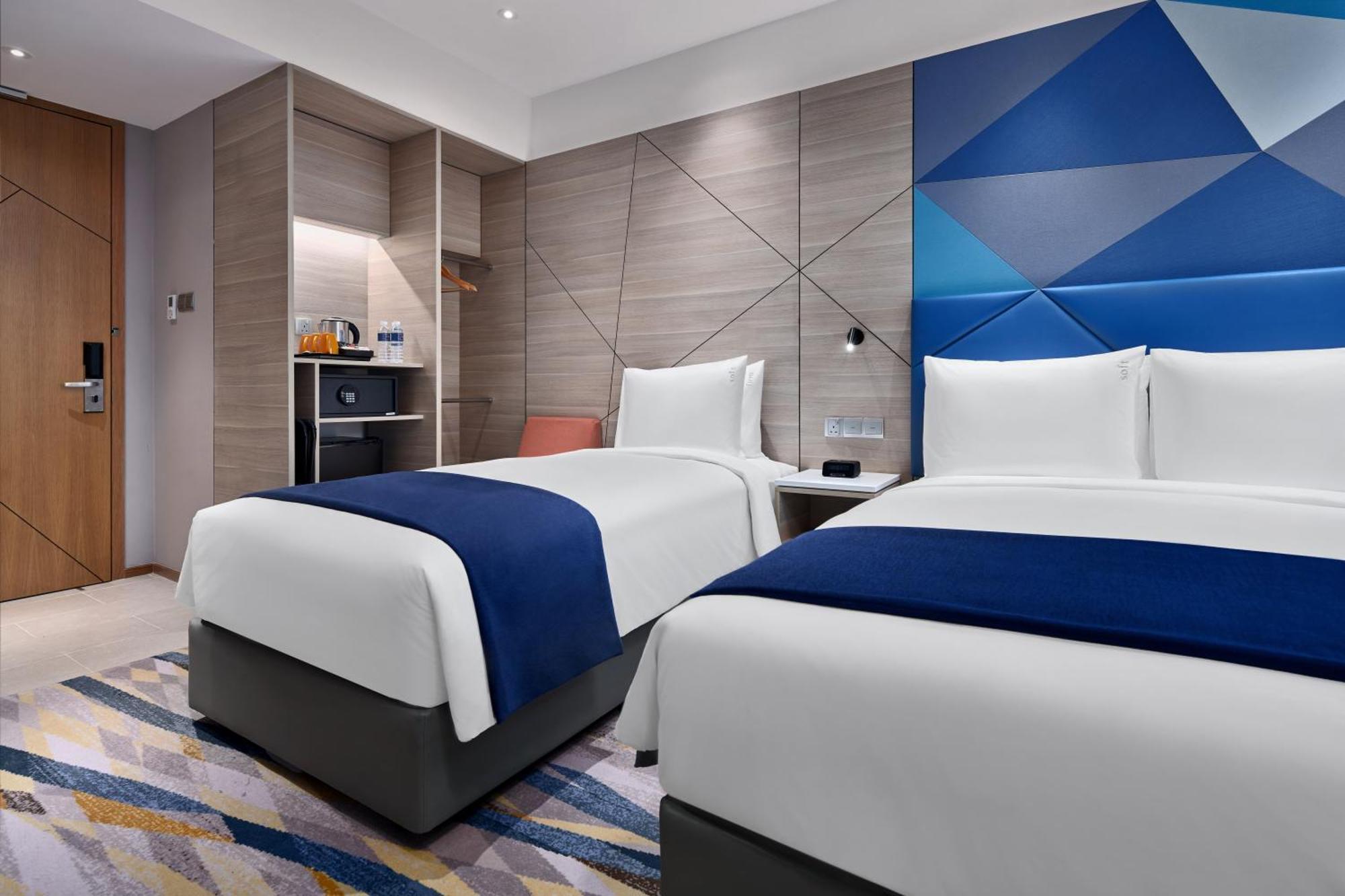 Standard Zimmer mit 1 Queensize-Bett und 1 Einzelbett - Kostenloses Frühstück