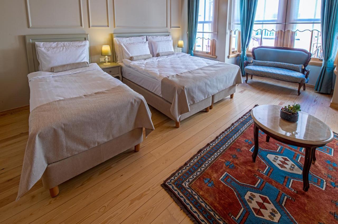 Deluxe Dreibettzimmer