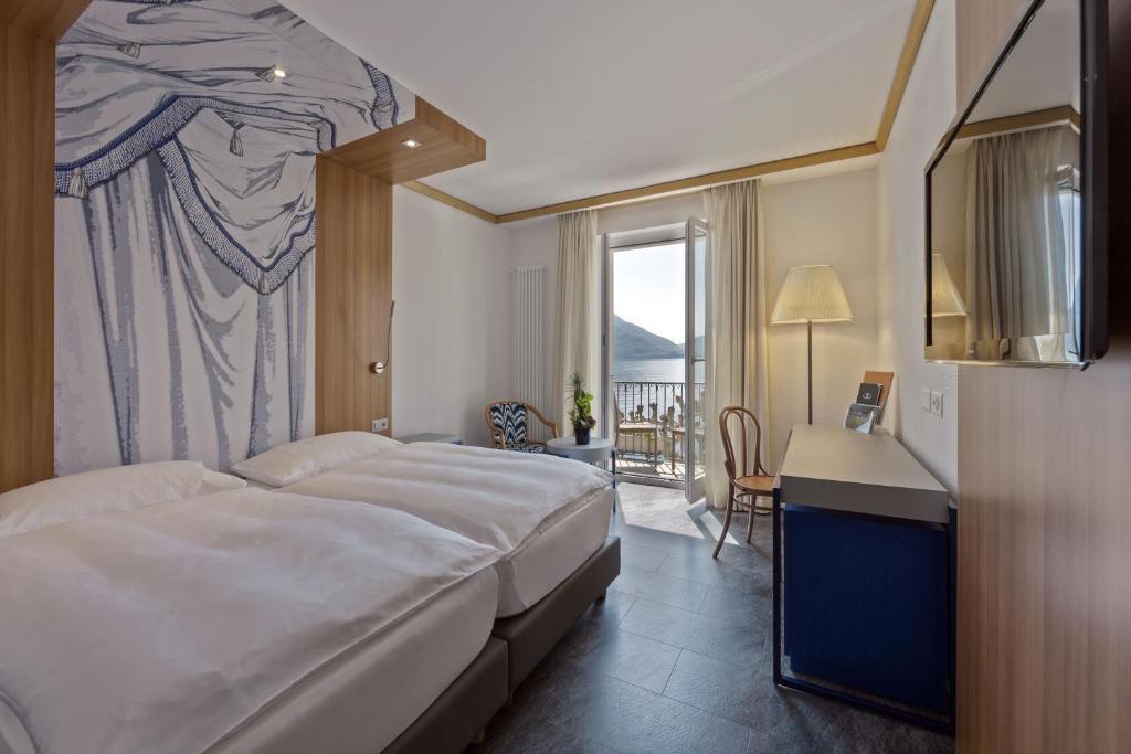 Zweibettzimmer mit Balkon und Seeblick
