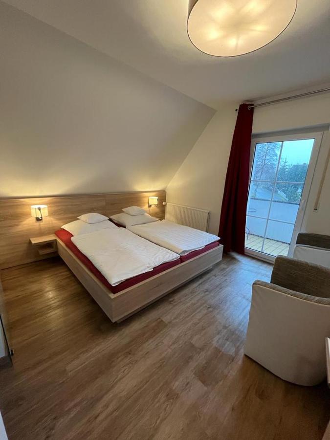 Familiensuite mit Balkon