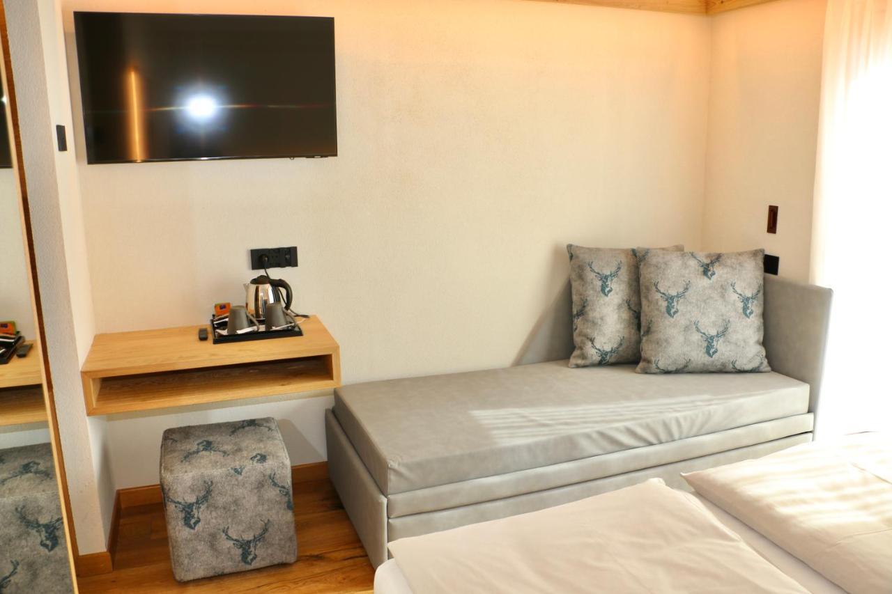 Dreibettzimmer mit Balkon