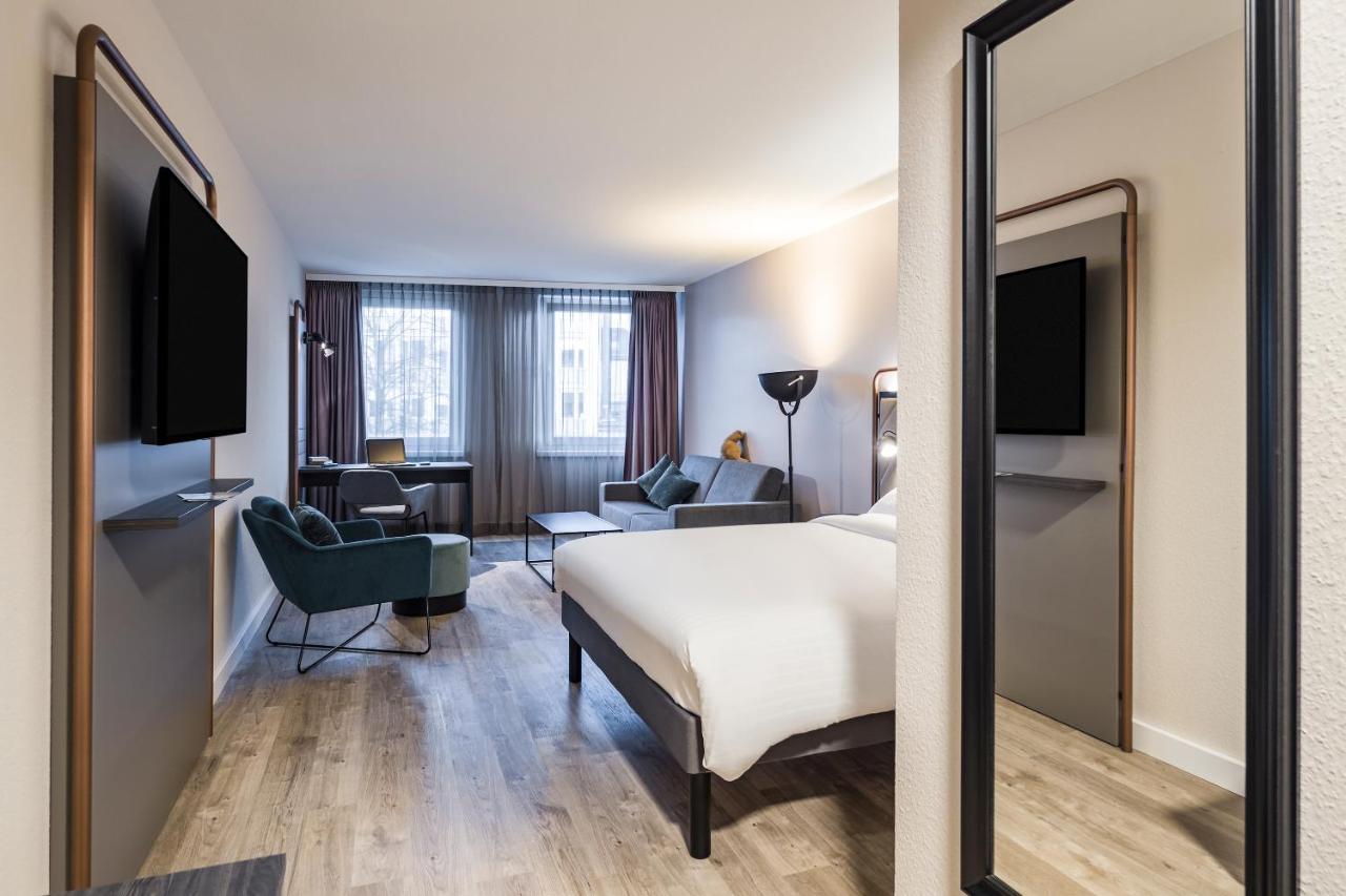 Familienzimmer mit einem Sweet Bed 160x200 by ibis Styles und einem Schlafsofa