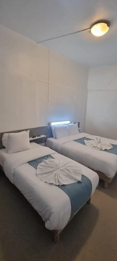 Dreibettzimmer mit Gemeinschafts-WC