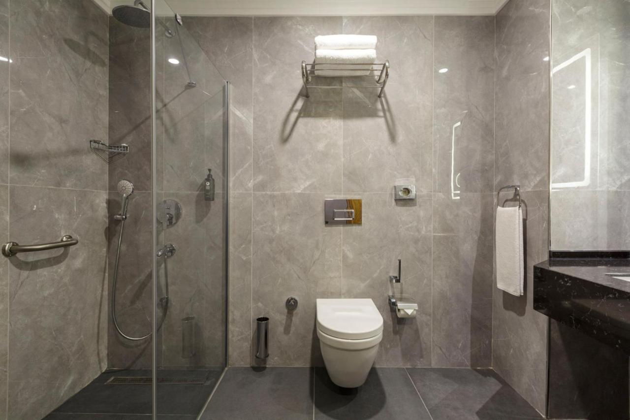 Deluxe Dreibettzimmer mit Balkon