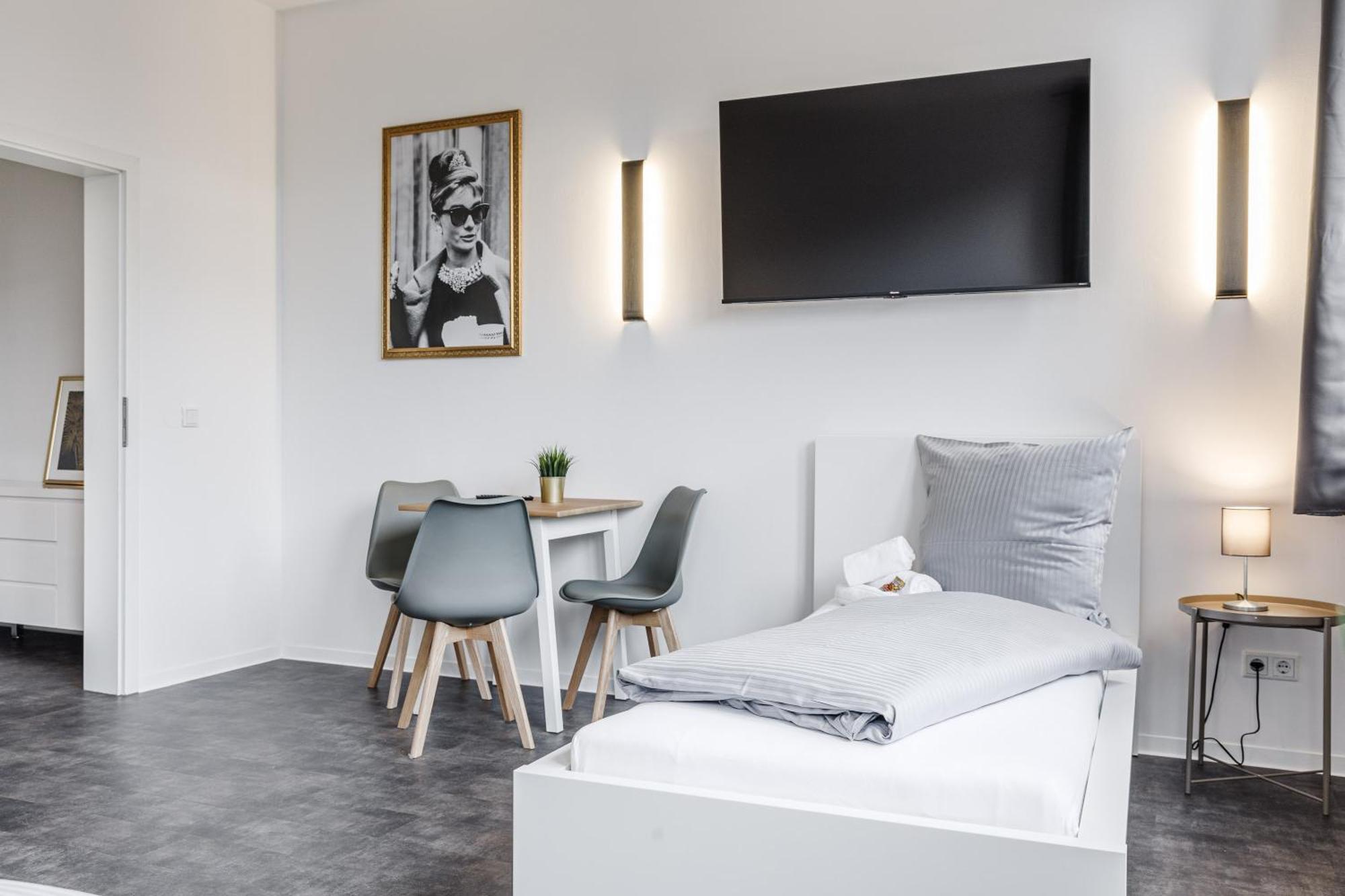 Dreibettzimmer mit Gemeinschaftsbad