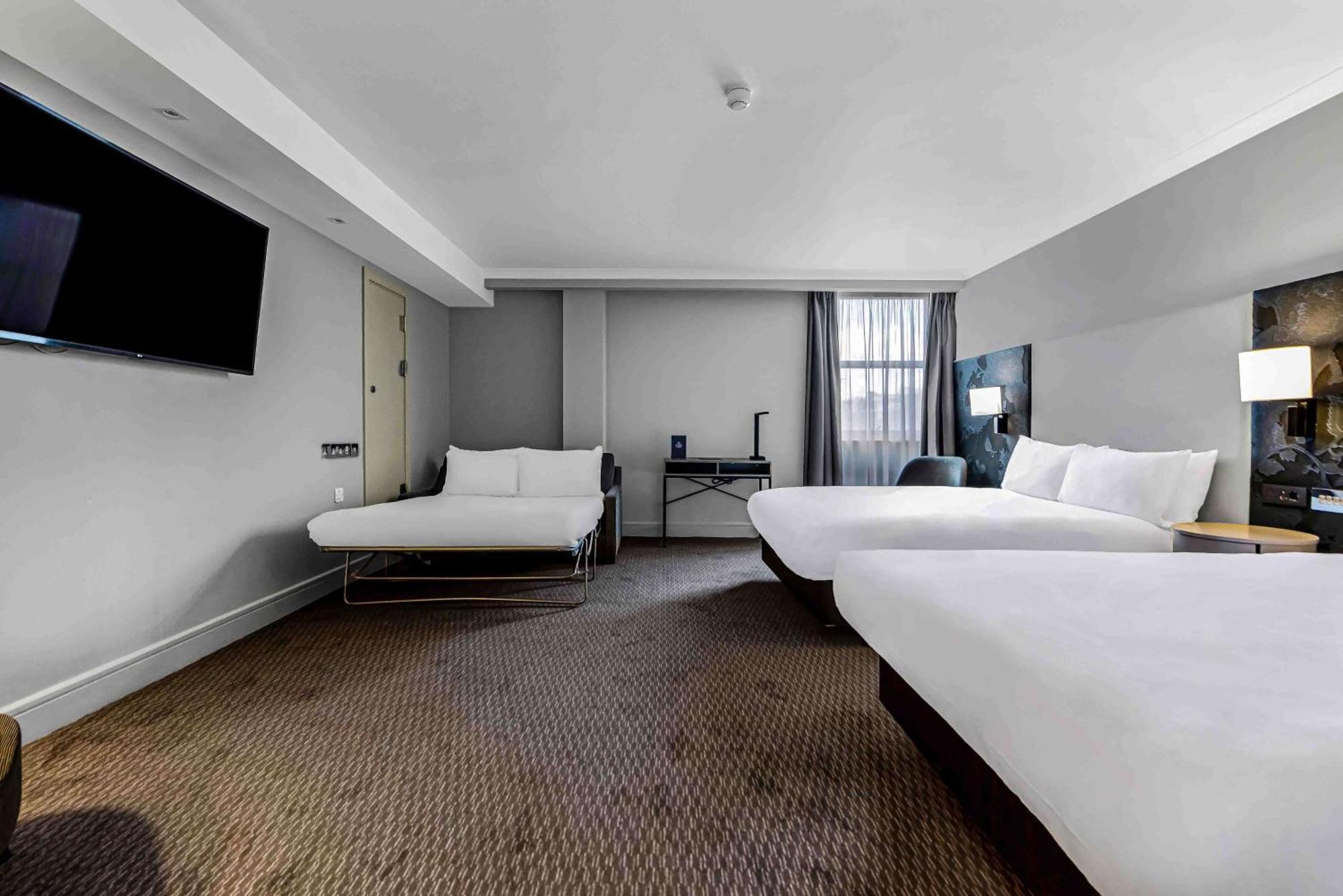 Deluxe Doppelzimmer mit 3 Doppelbetten