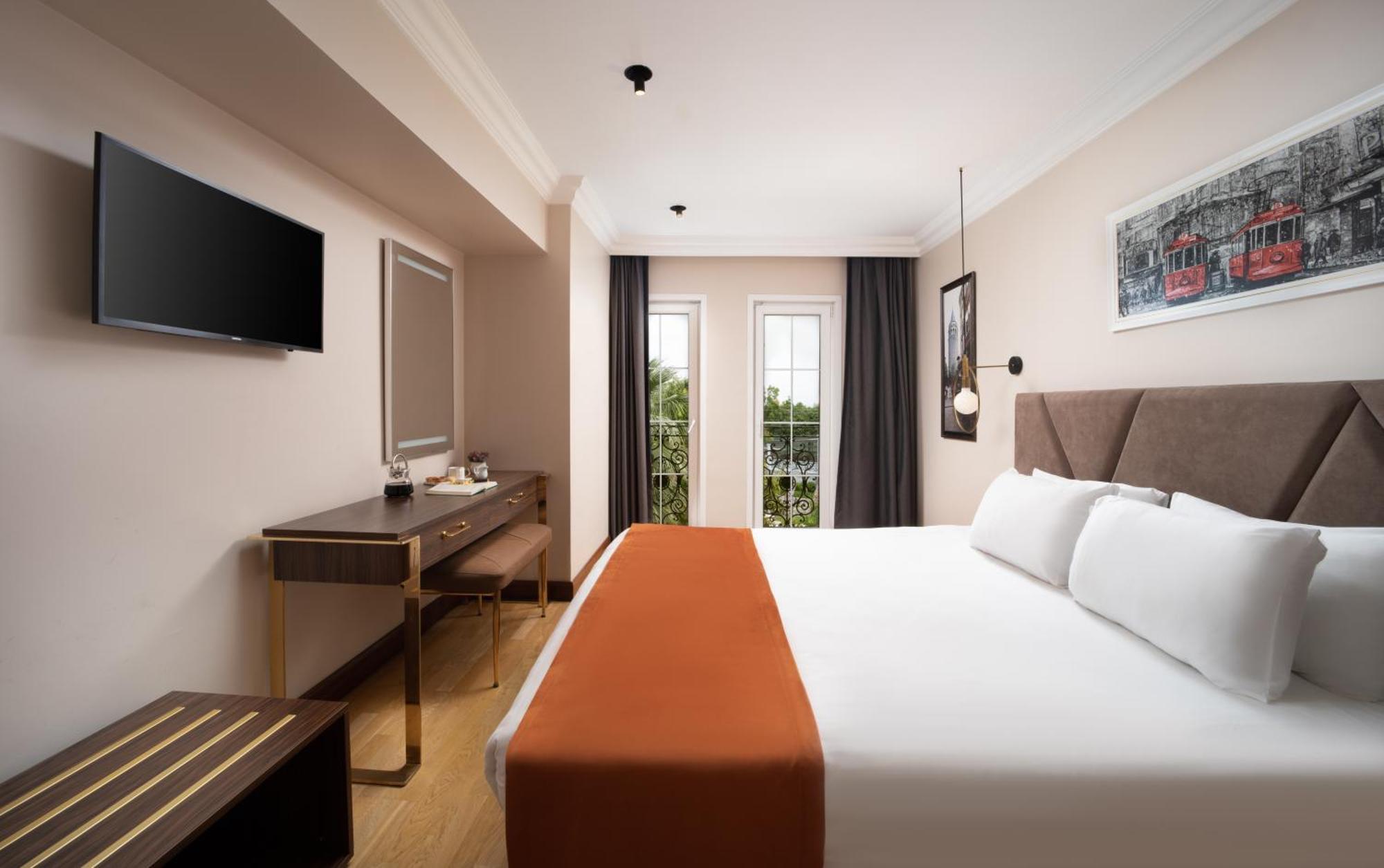 Zimmer mit Queensize-Bett und Meerblick