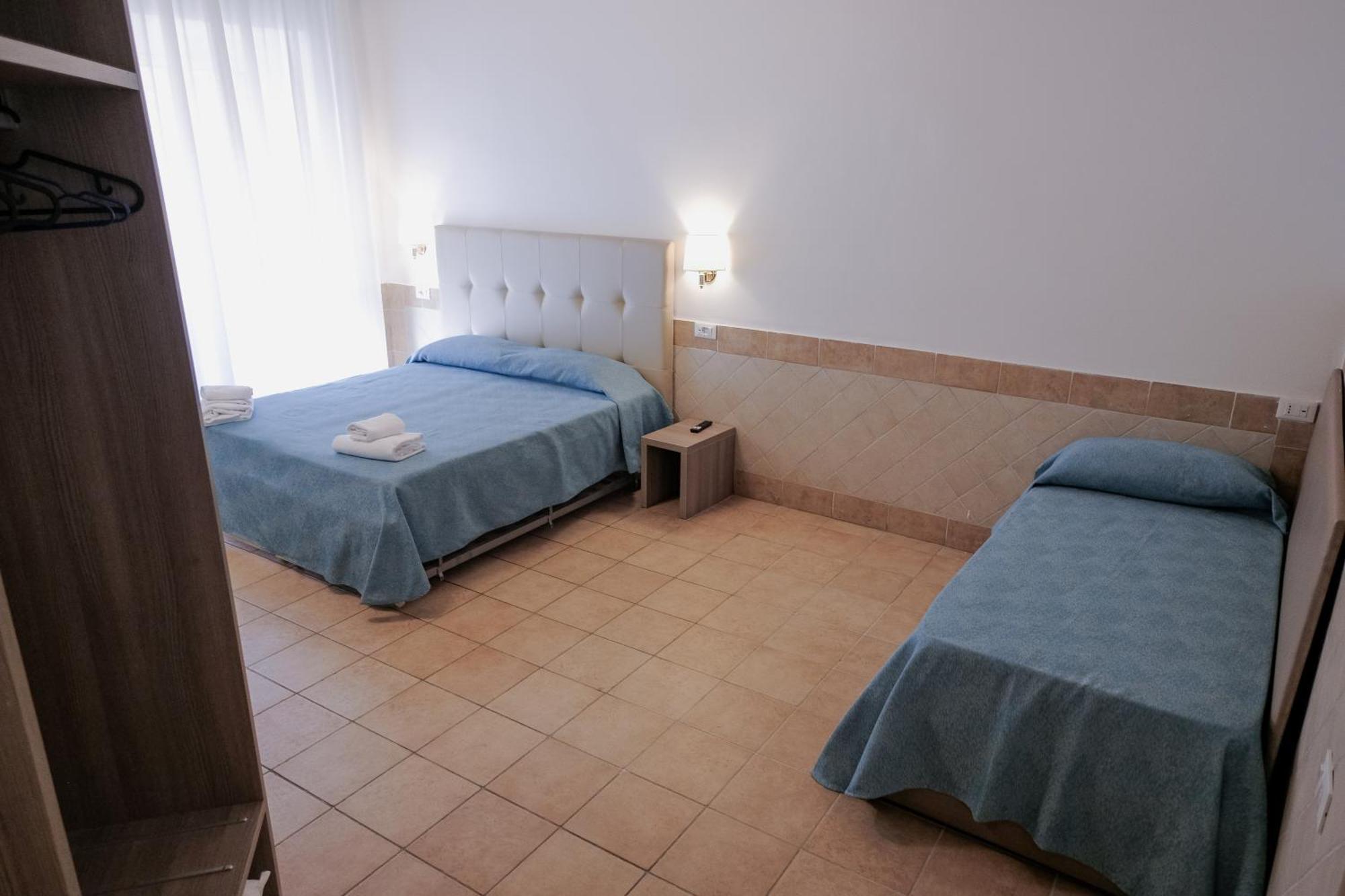 Dreibettzimmer mit eigenem Bad