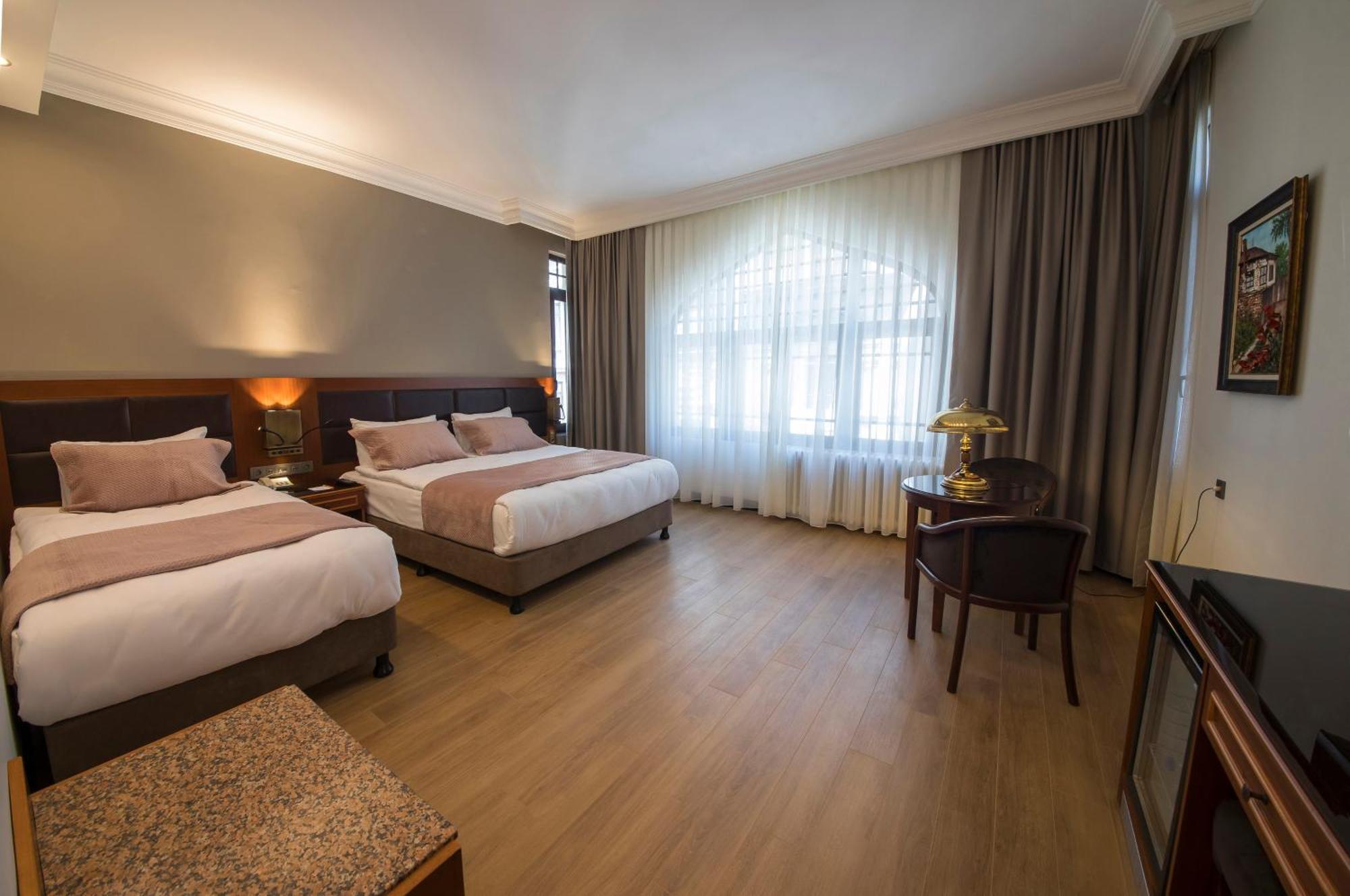 Deluxe Dreibettzimmer