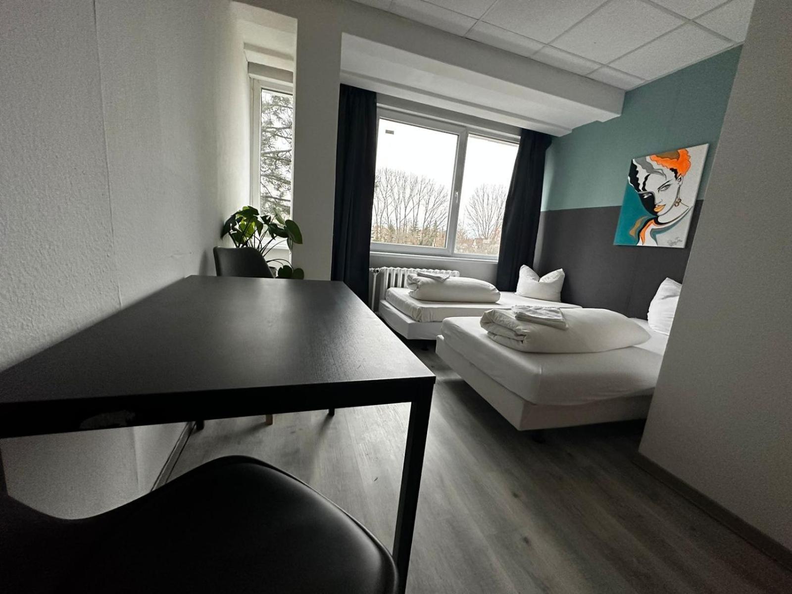 Zweibettzimmer mit Gartenblick