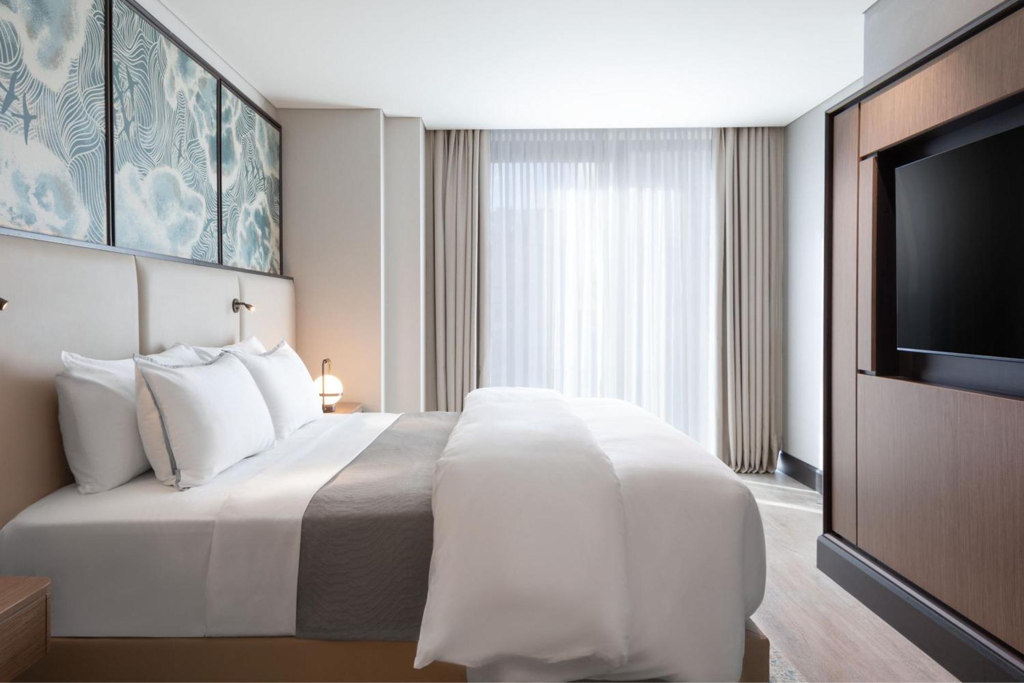 Premium Suite mit 1 Kingsize-Bett, Schlafsofa und Stadtblick