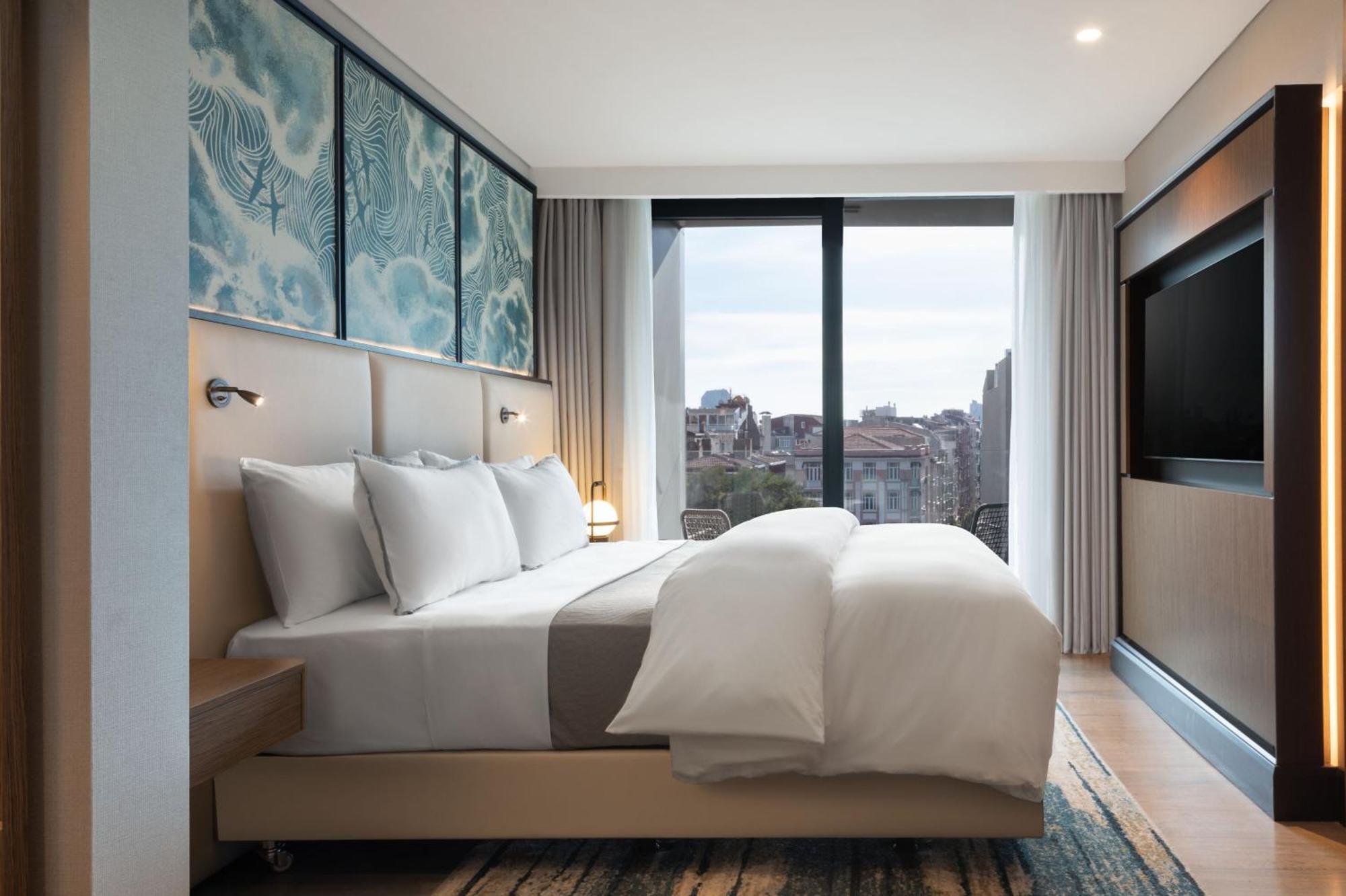 Premium Suite mit 1 Kingsize-Bett, Schlafsofa, Balkon und Stadtblick