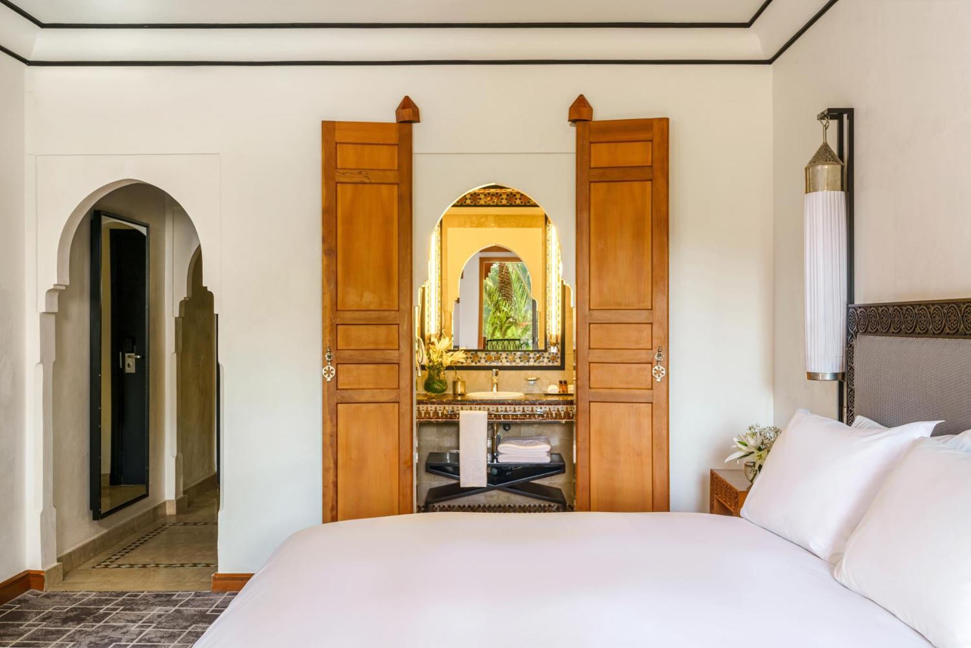 Deluxe Zimmer mit Balkon und Poolblick