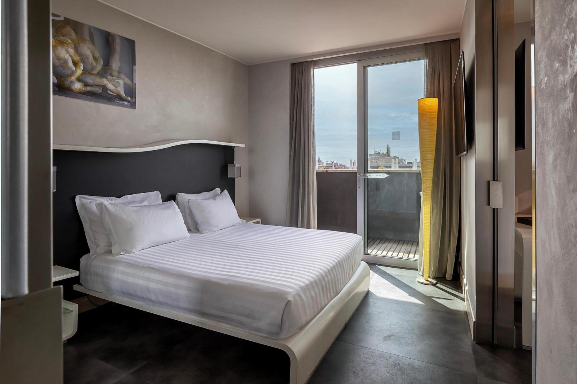 Junior Suite mit Kingsize-Bett, Terrasse und Stadtblick