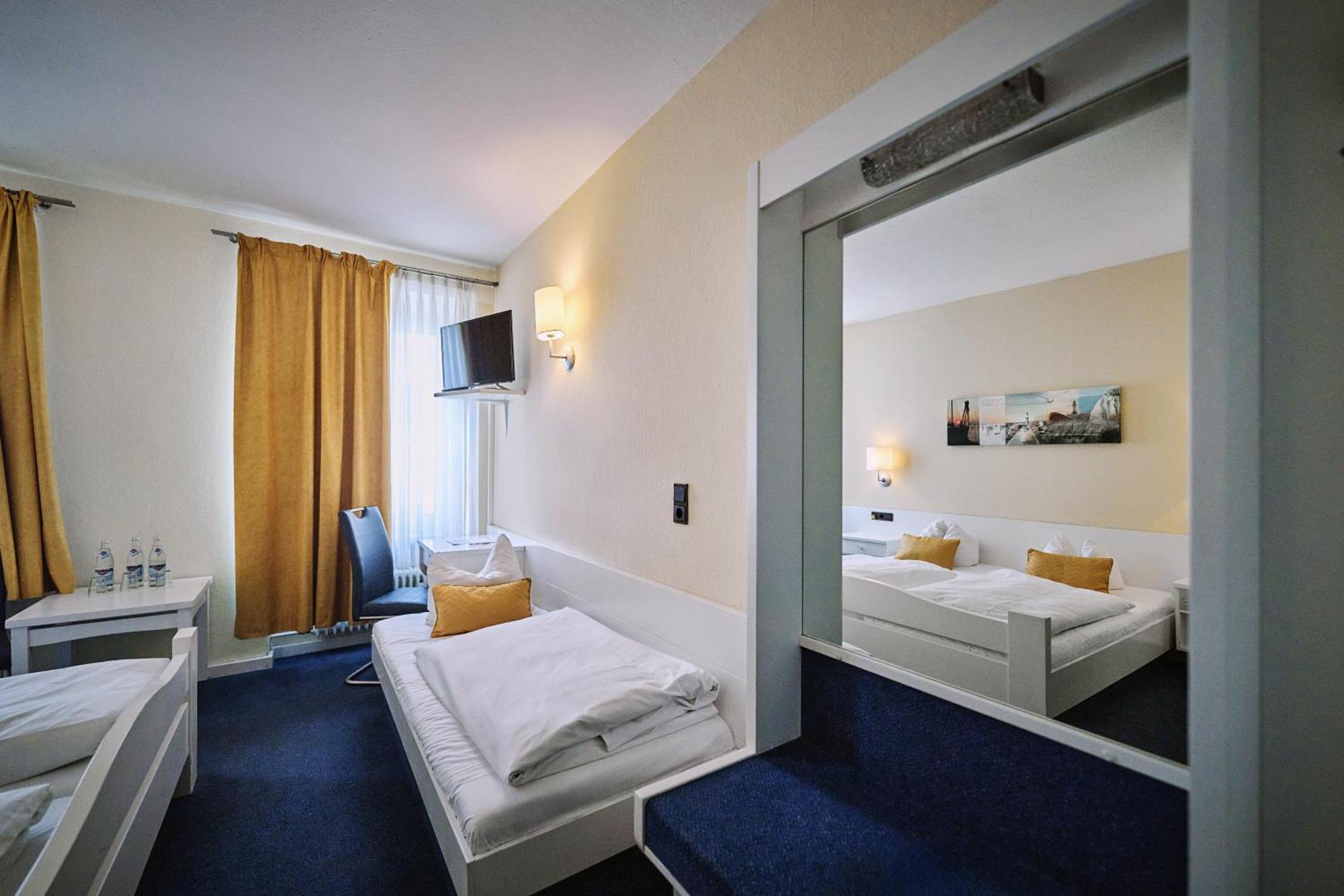 Dreibettzimmer