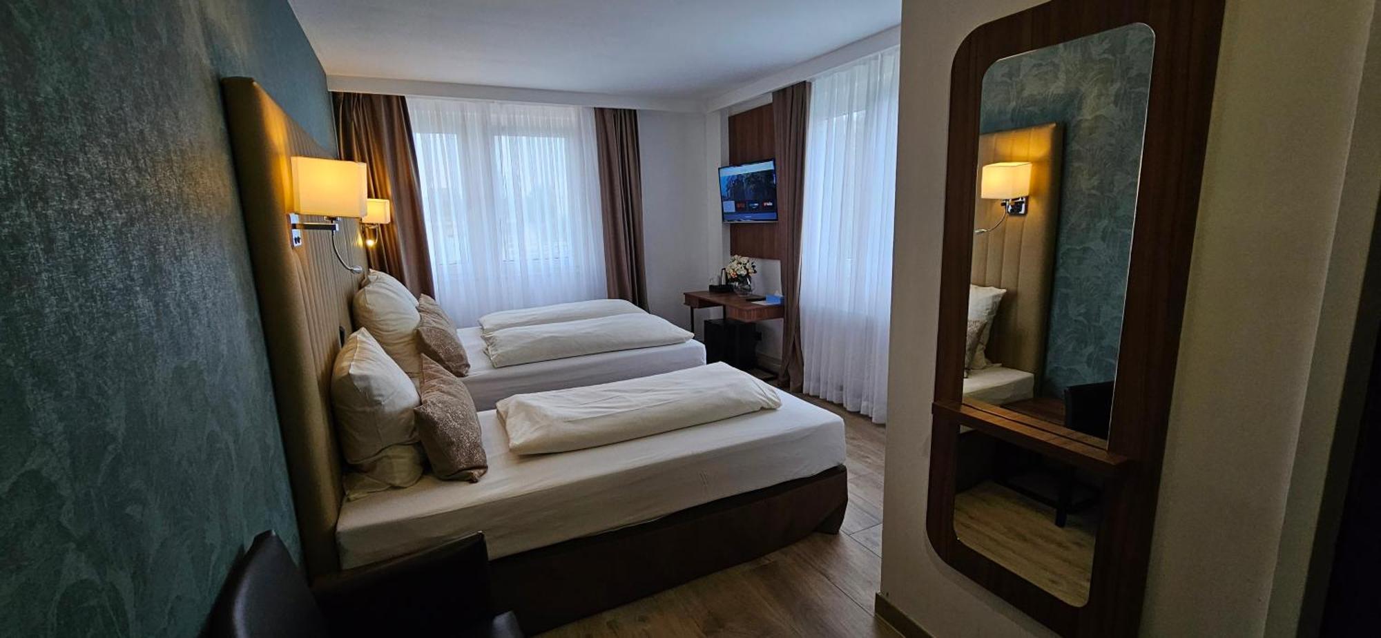 Dreibettzimmer
