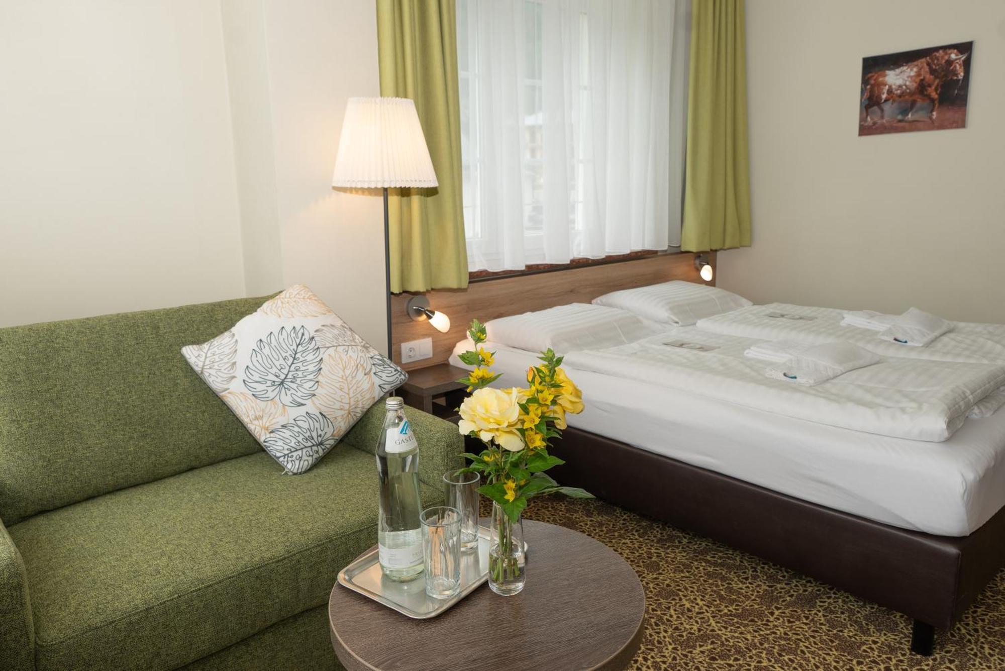 Classic Dreibettzimmer