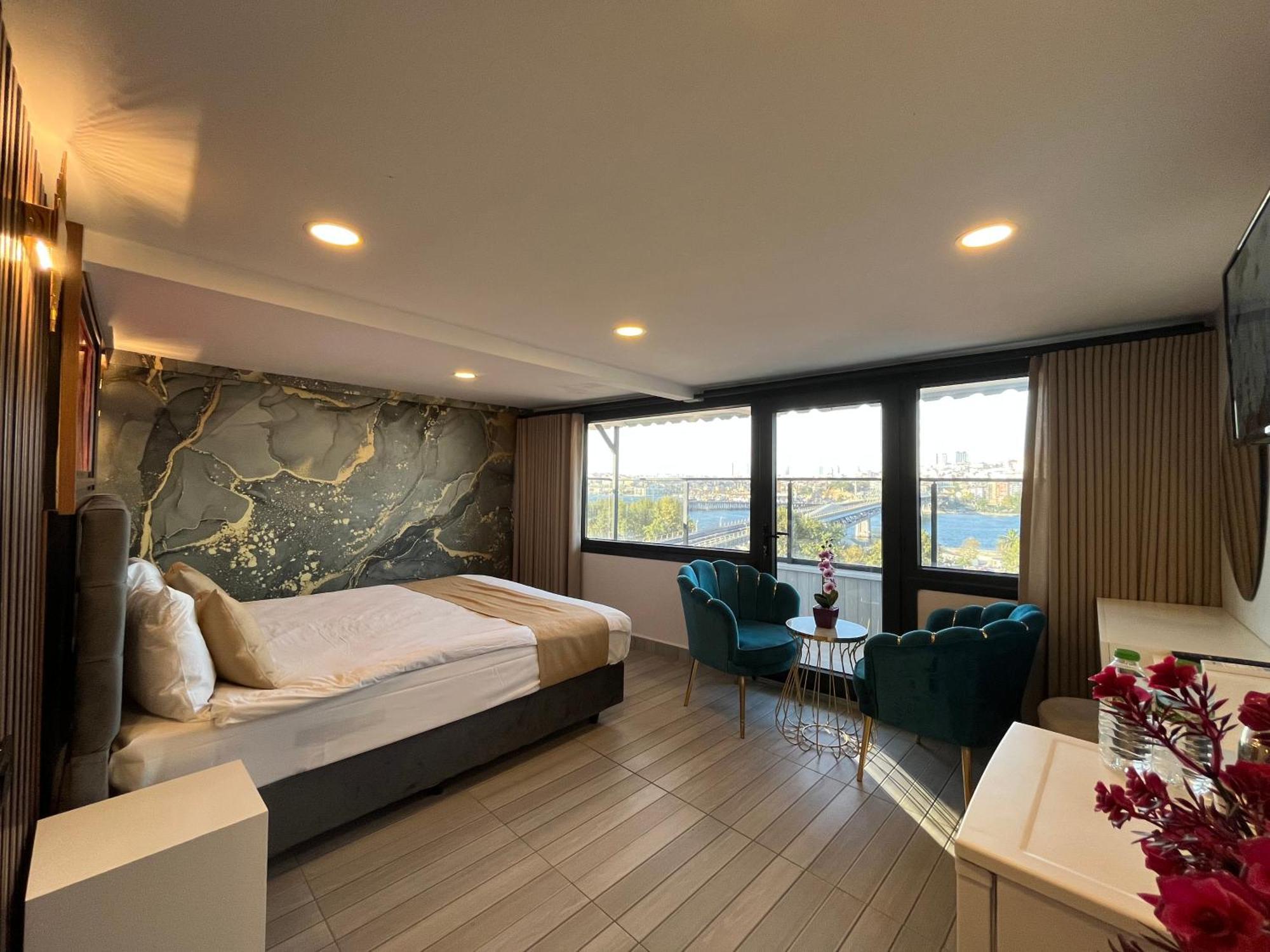 Doppelzimmer mit Balkon und Meerblick