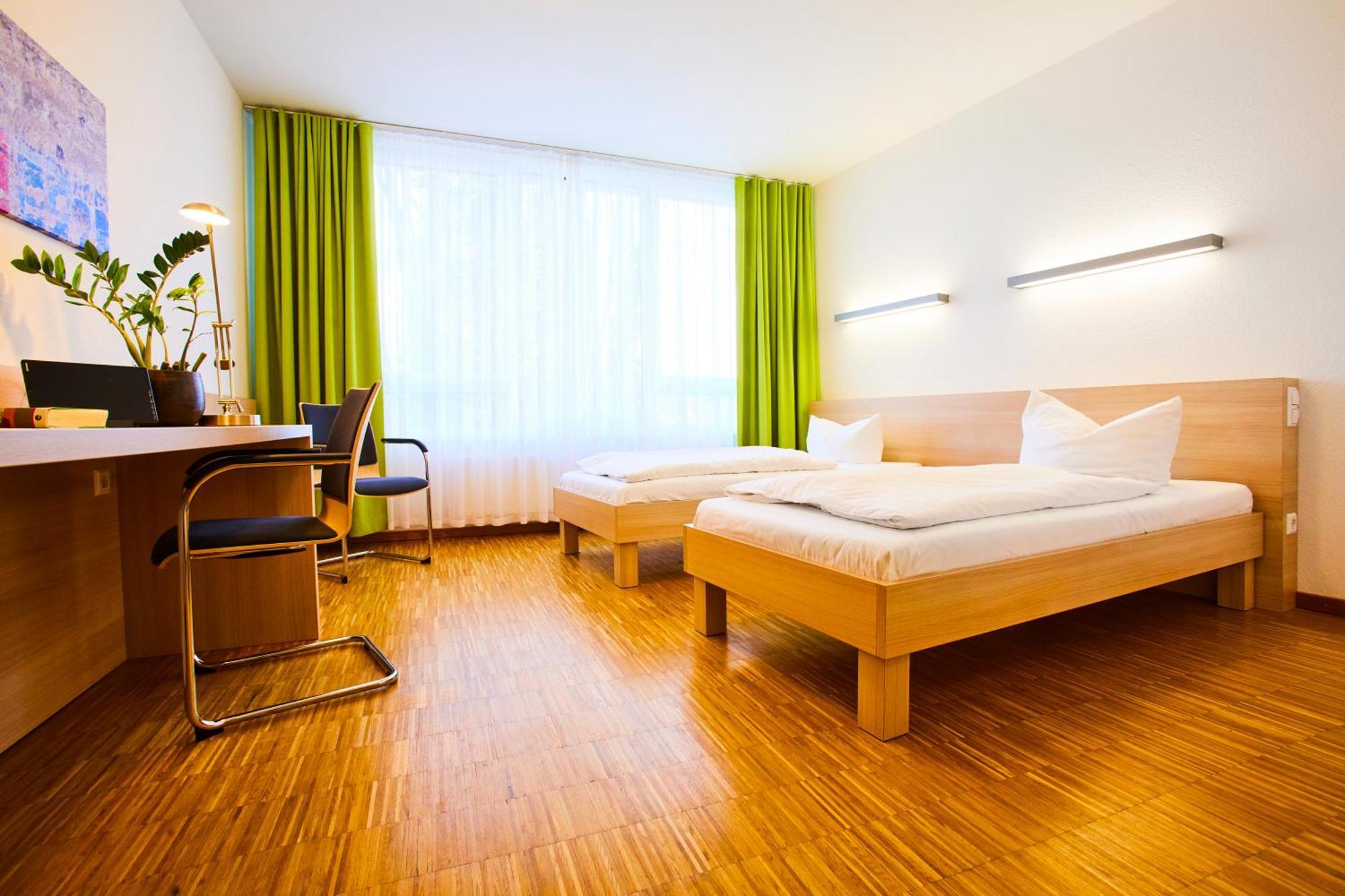 Doppelzimmer mit Gartenblick