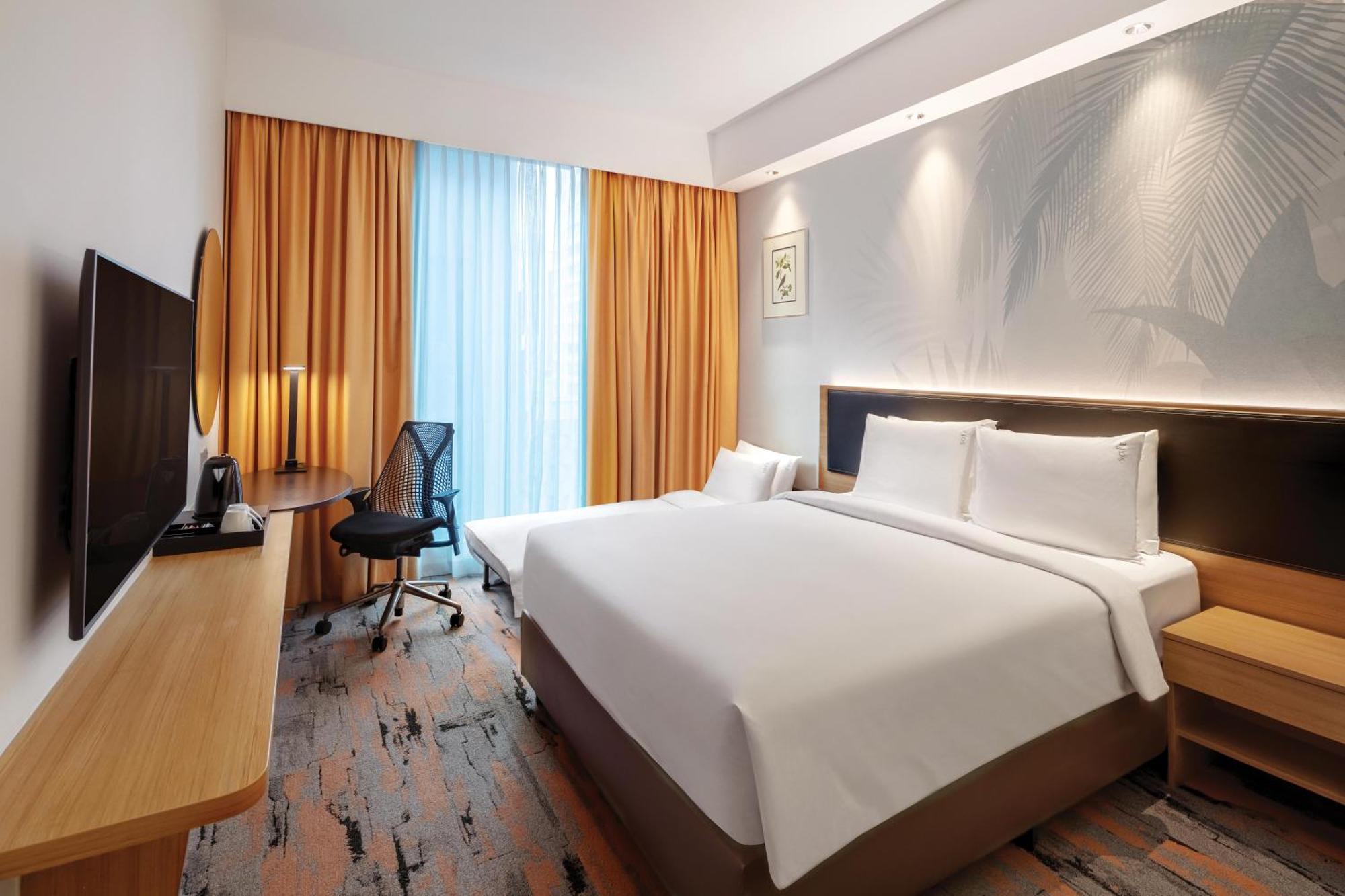 Standard Zimmer mit Queensize-Bett und Einzelschlafsofa – kostenloses Frühstück