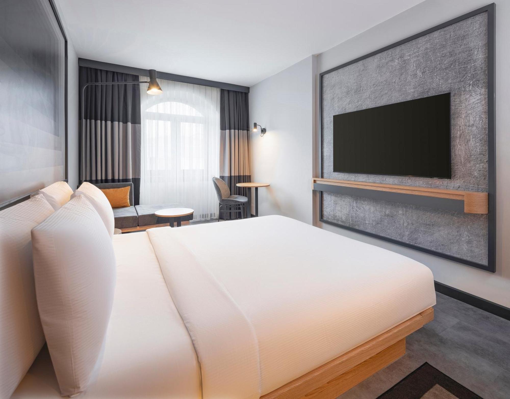 Deluxe Zimmer mit Queensize-Bett und Stadtblick