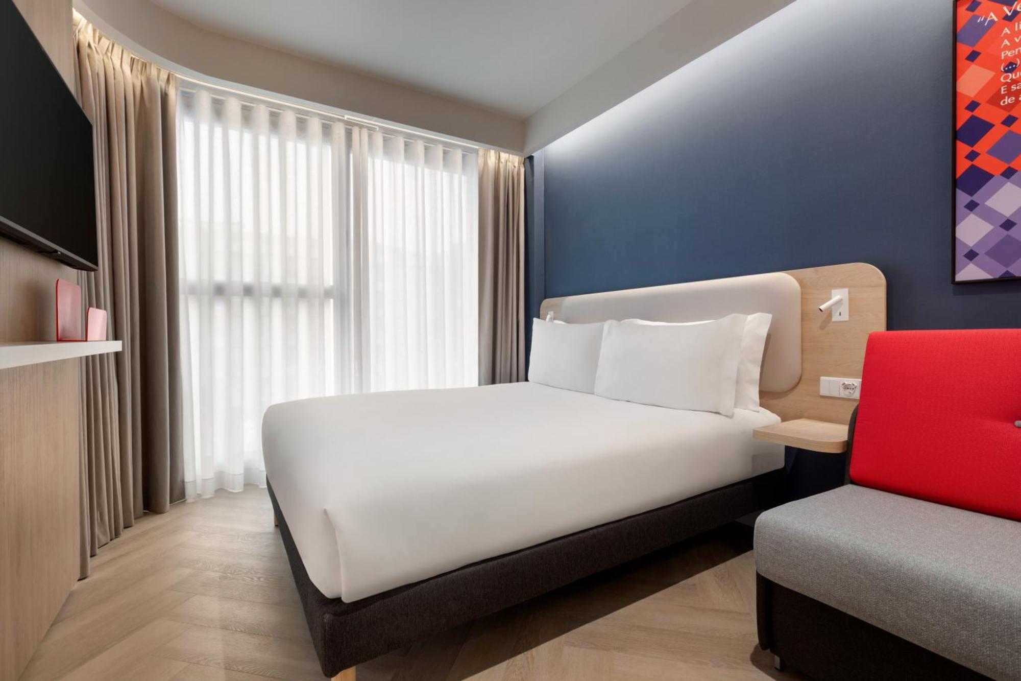 Standard Zimmer mit Queensize-Bett und Einzelschlafsofa – kostenloses Frühstück
