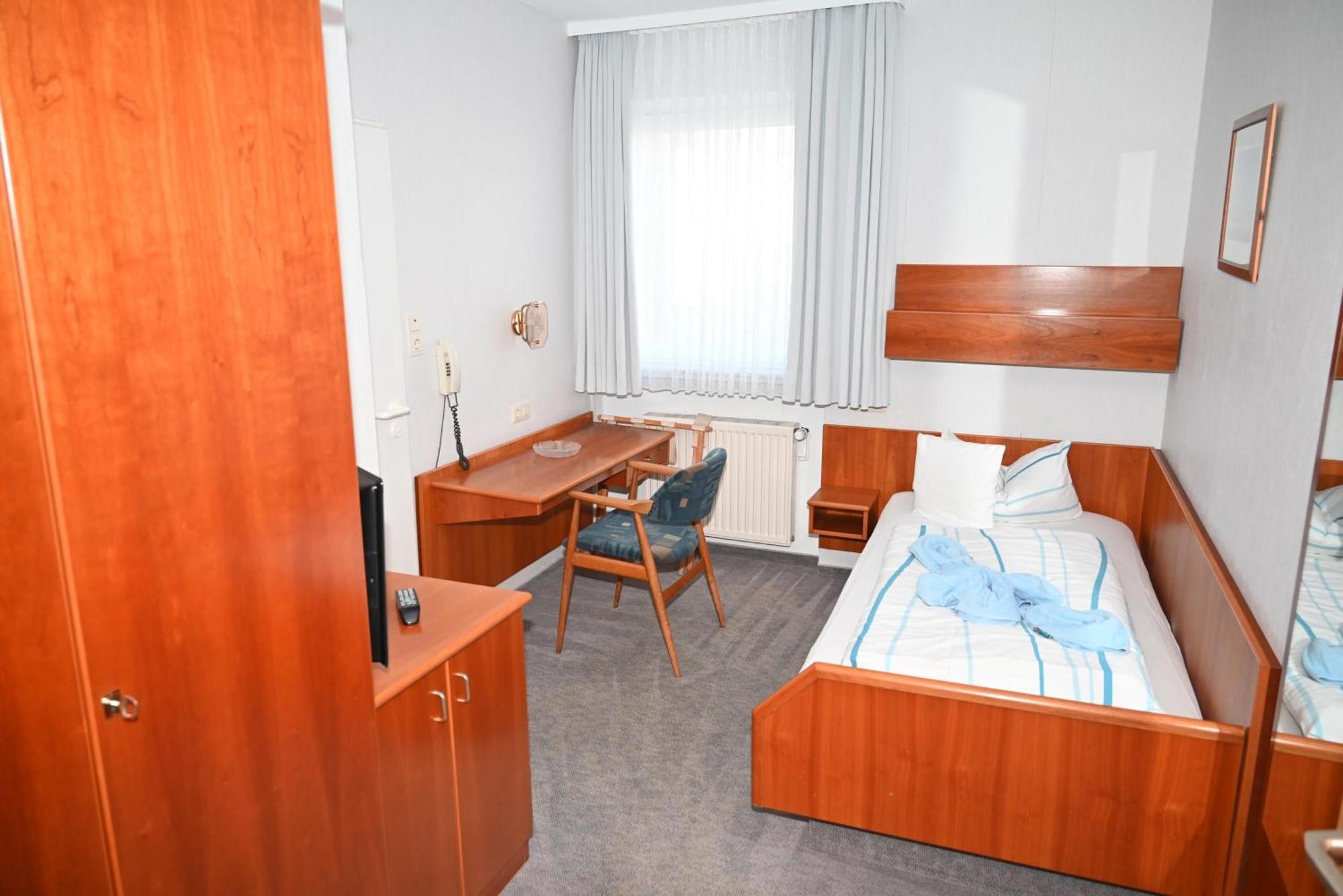 Standard Einzelzimmer mit Dusche