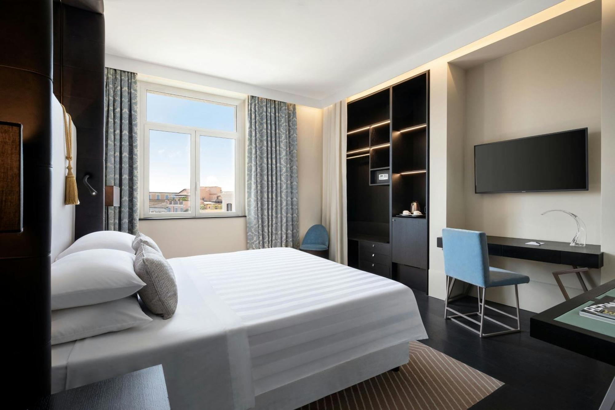 Executive Deluxe Zimmer mit Kingsize-Bett und Stadtblick