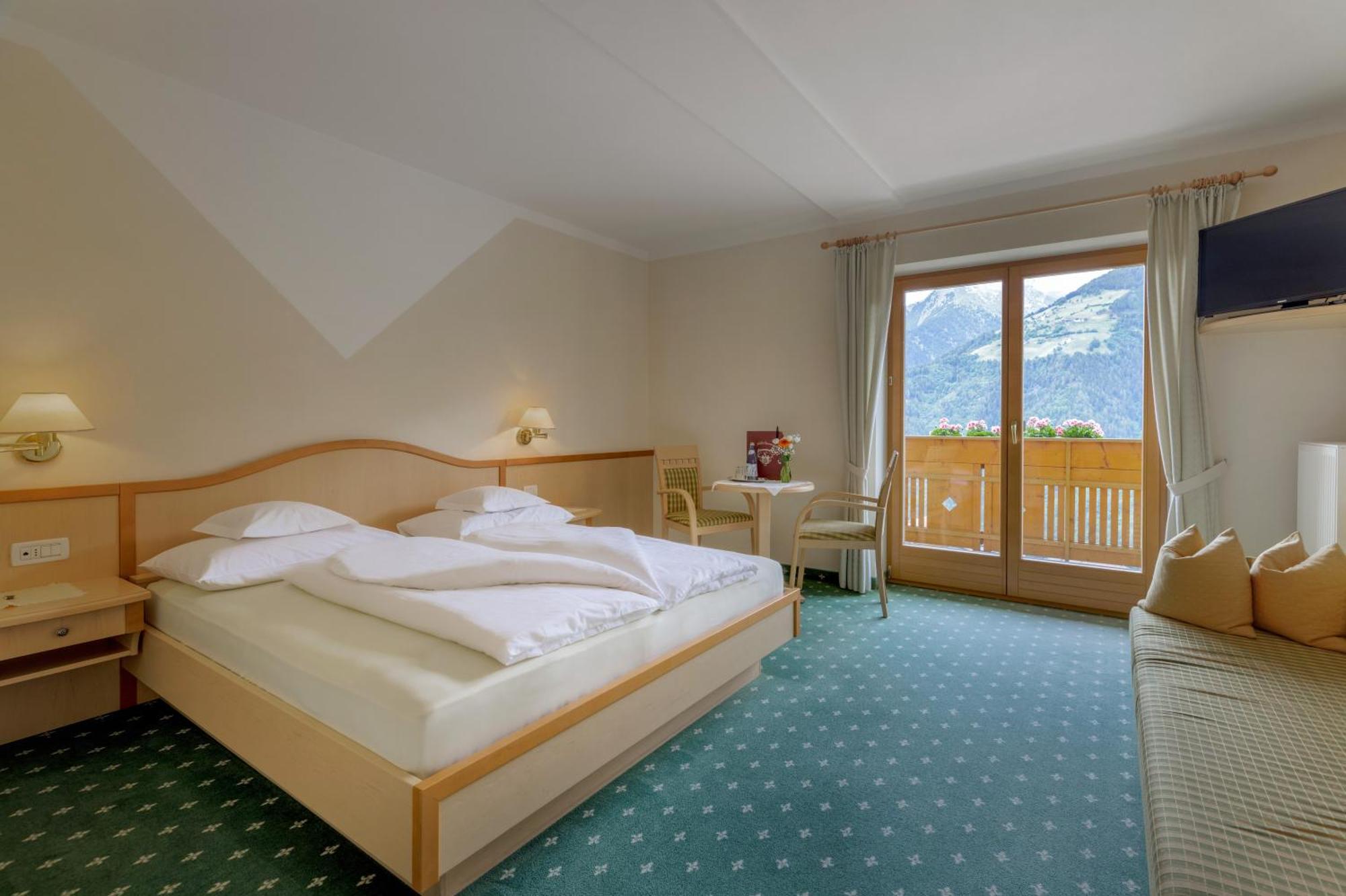 Dreibettzimmer mit Balkon