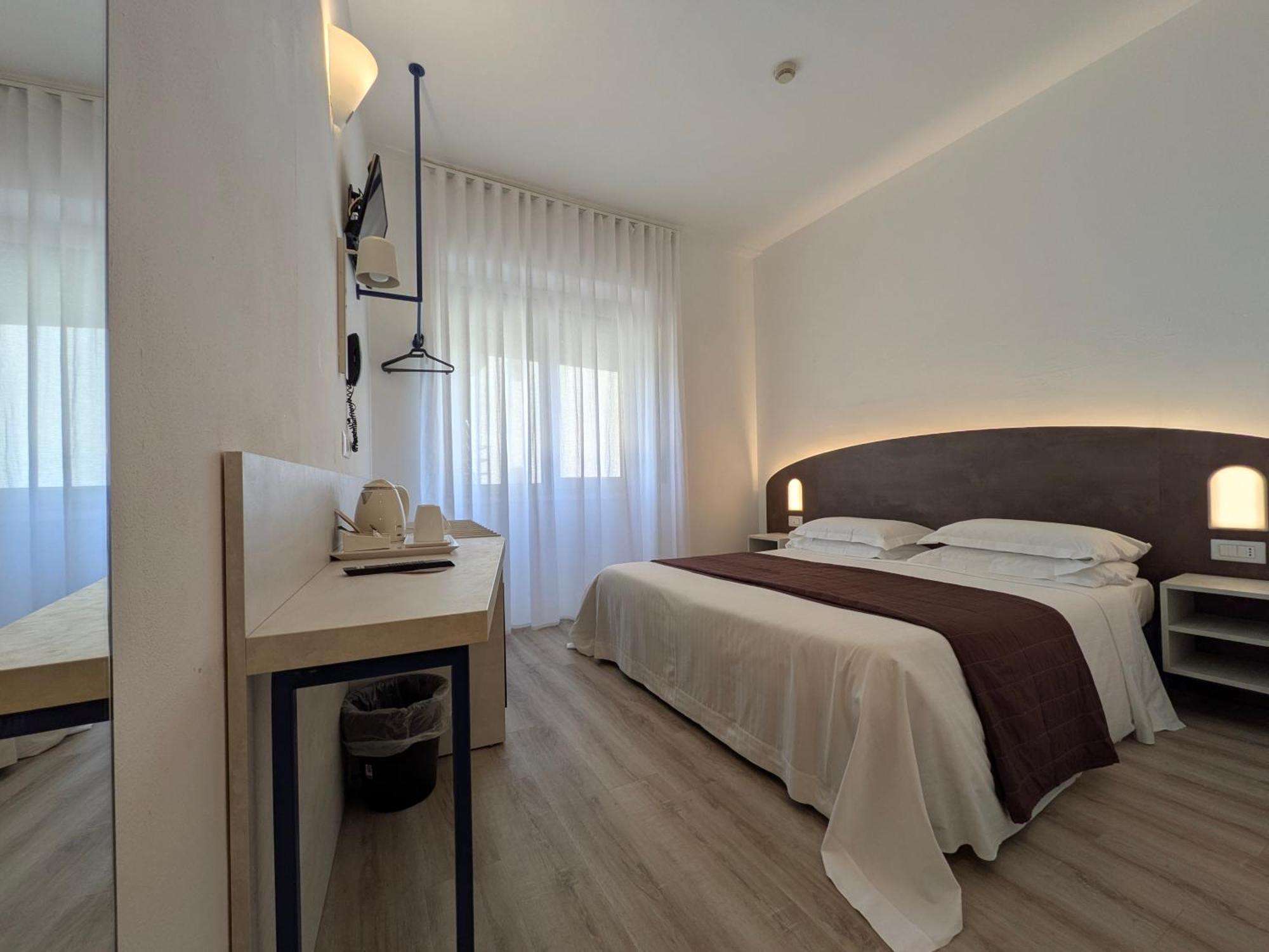 Doppel- oder Zweibettzimmer