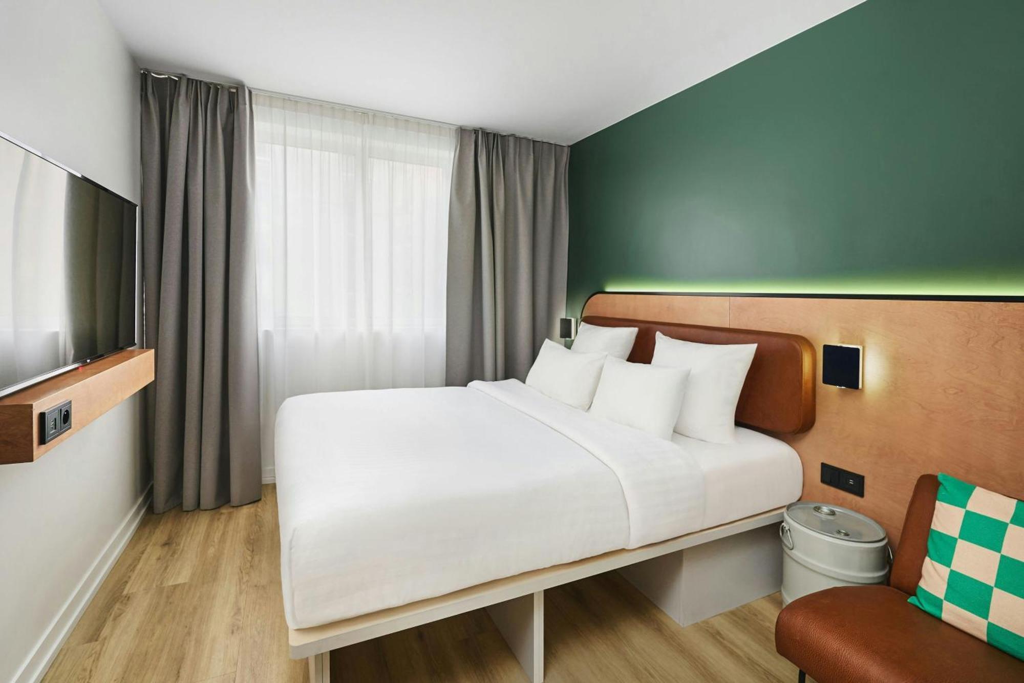 MOXY Sleeper Zimmer mit Queensize-Bett
