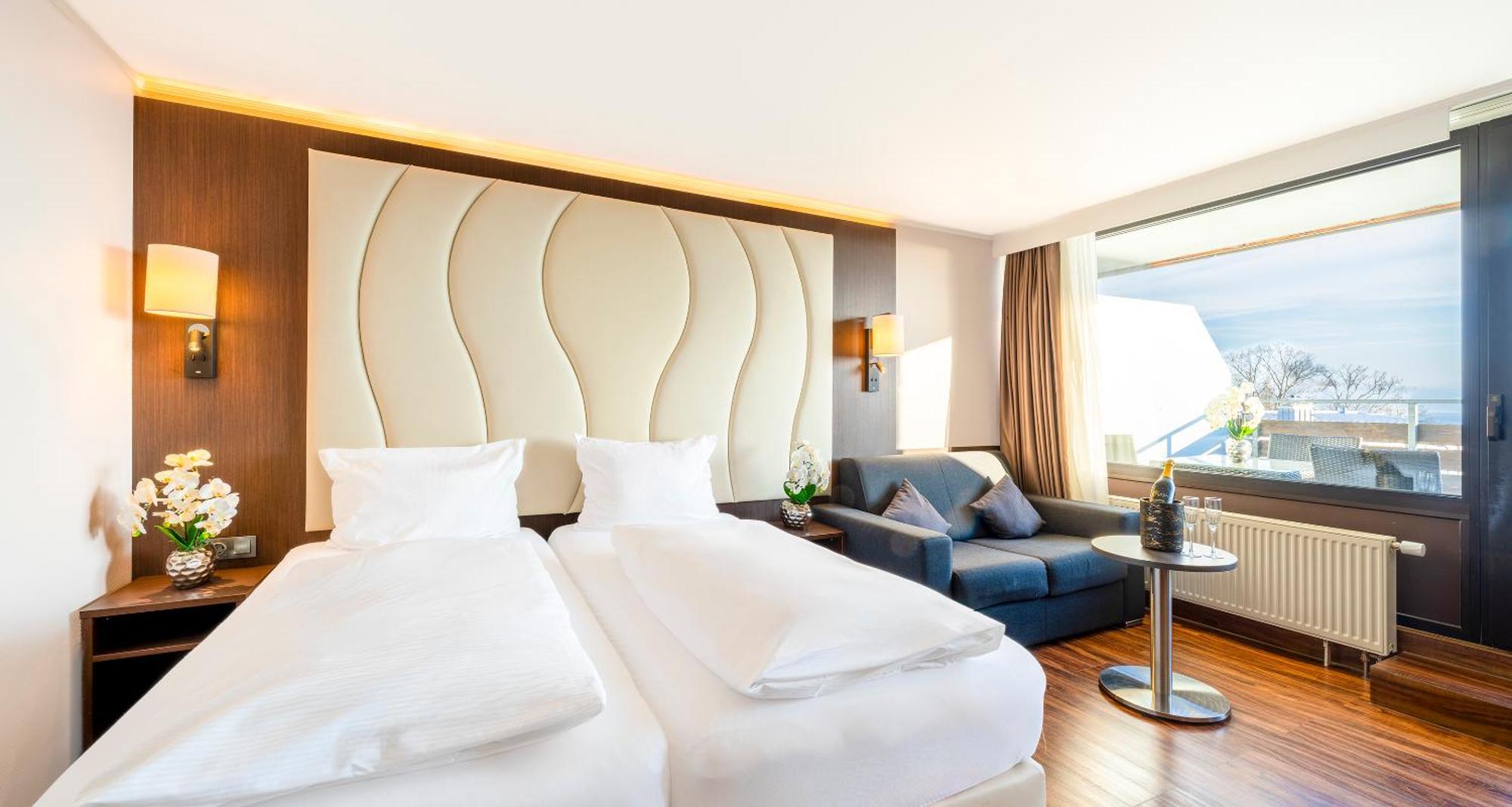 Dreibettzimmer mit Balkon