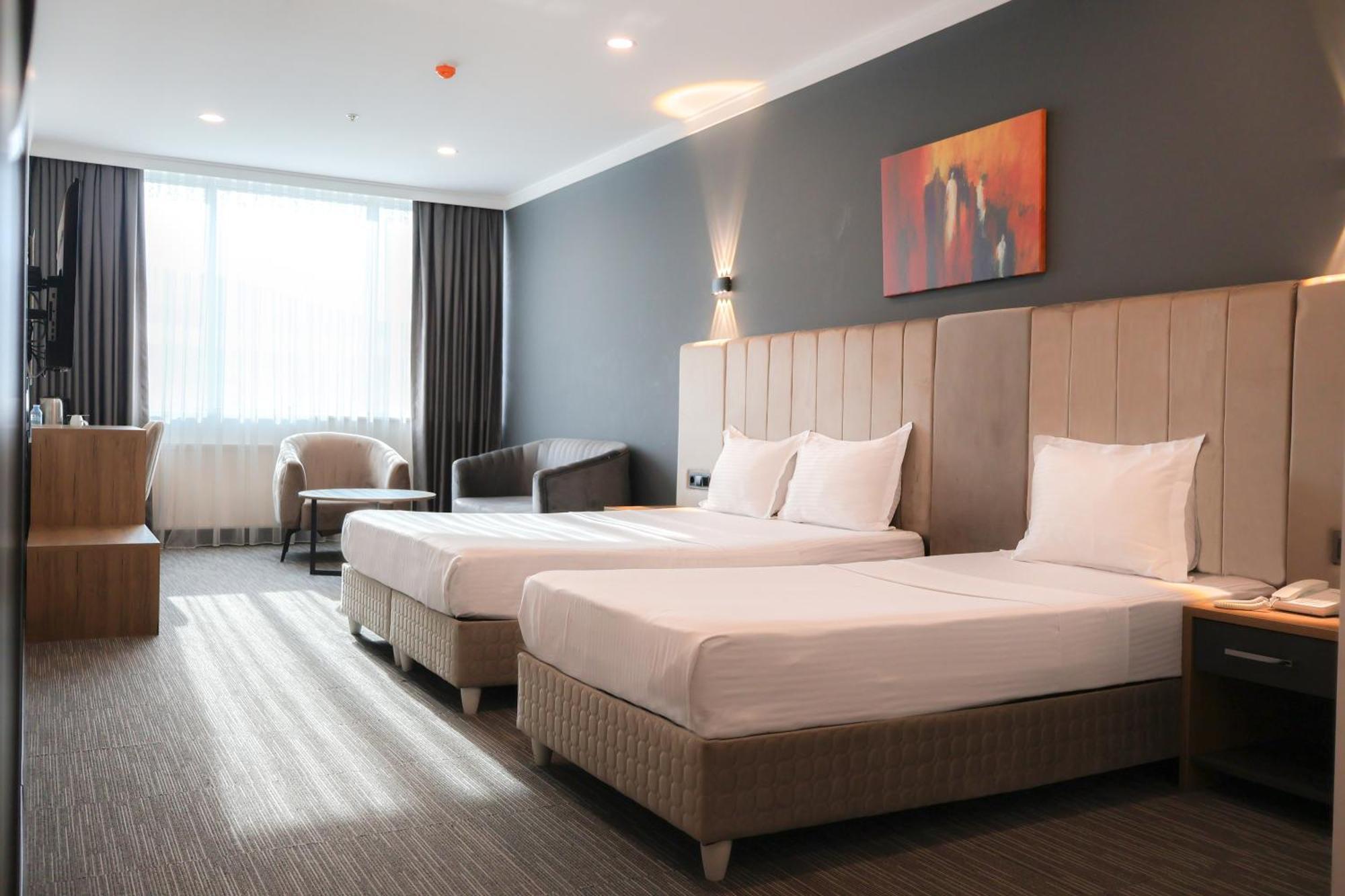 Deluxe Dreibettzimmer
