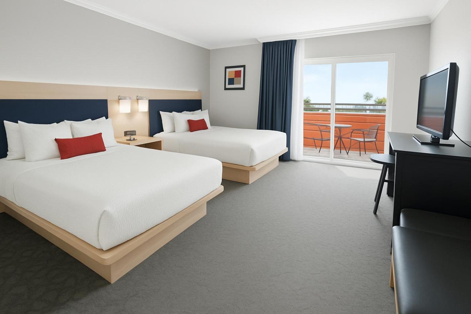 Zimmer mit 2 Queensize-Betten und Balkon