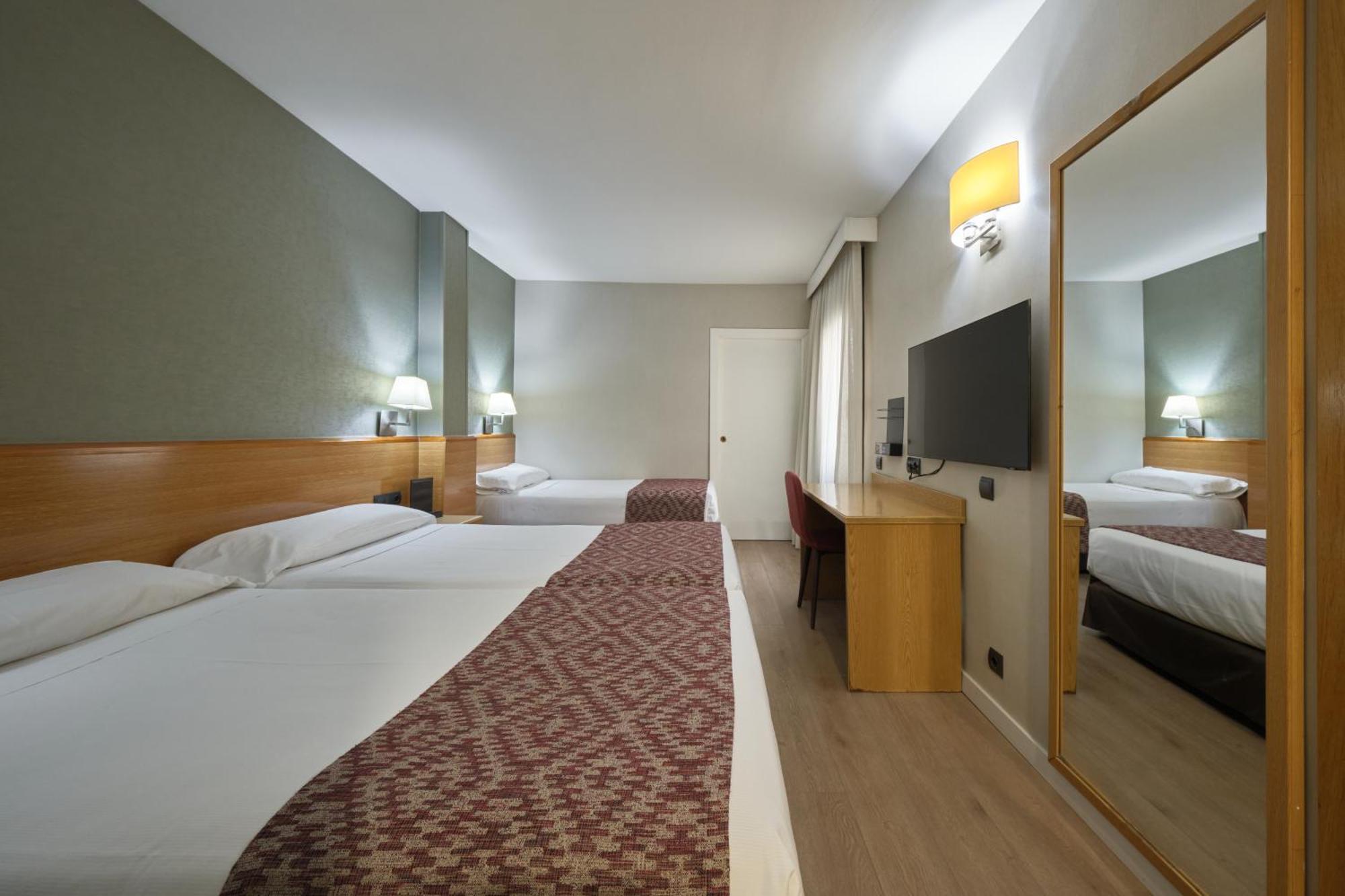 Dreibettzimmer (2 Erwachsene + 1 Kind)