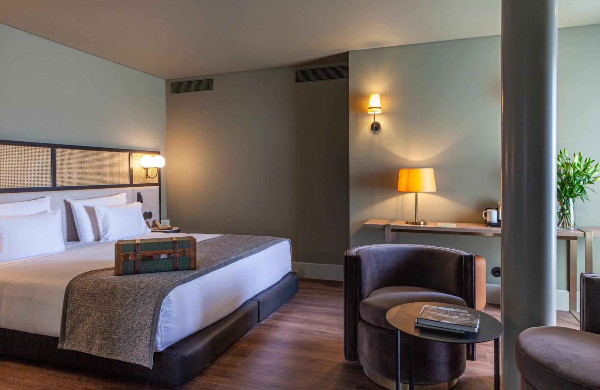 Suite mit Kingsize-Bett und Balkon