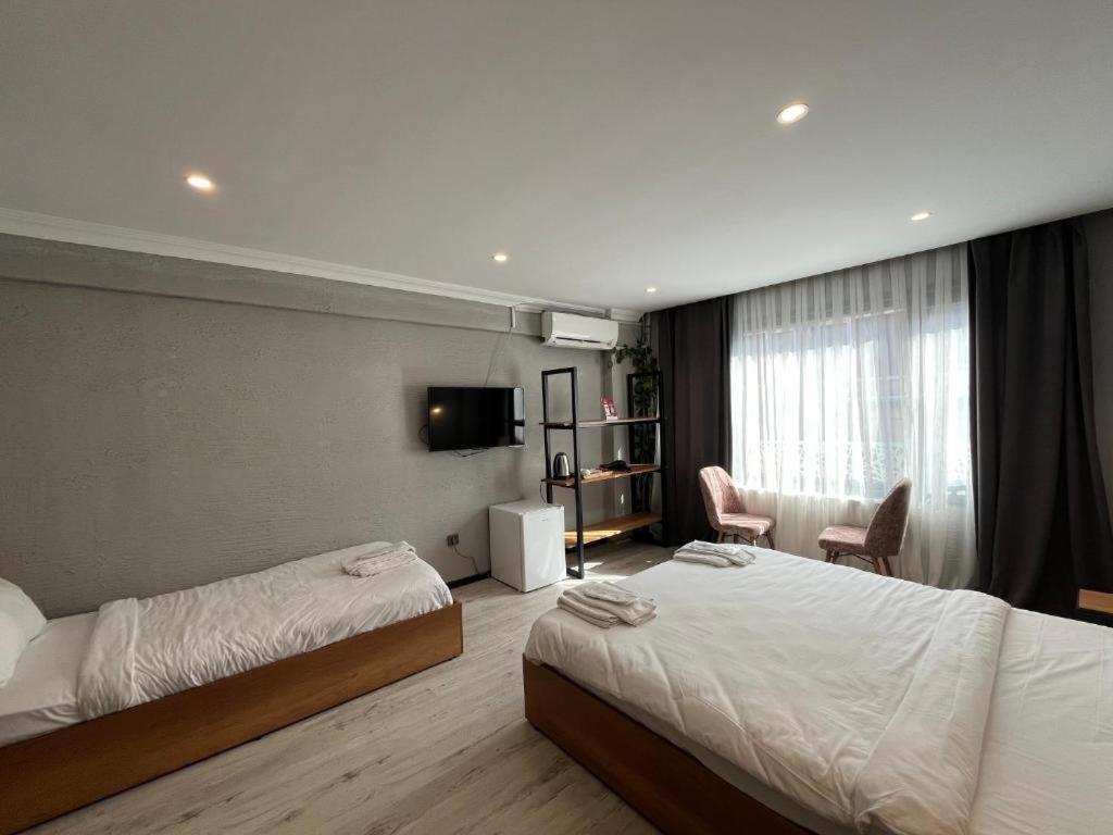 Deluxe Dreibettzimmer