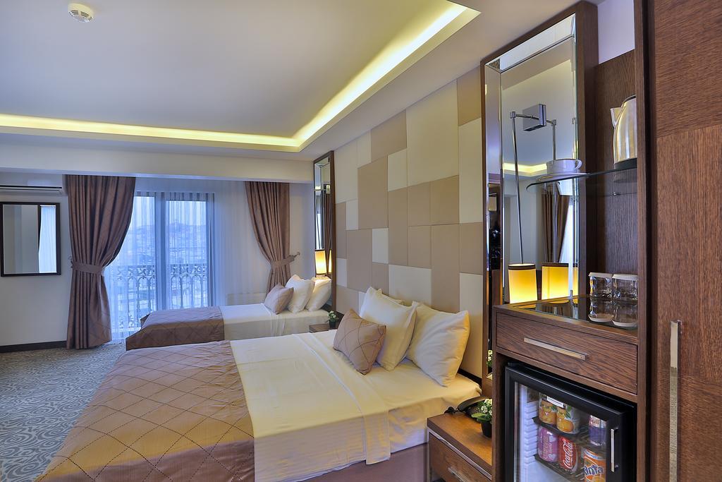 Deluxe Dreibettzimmer mit Meerblick