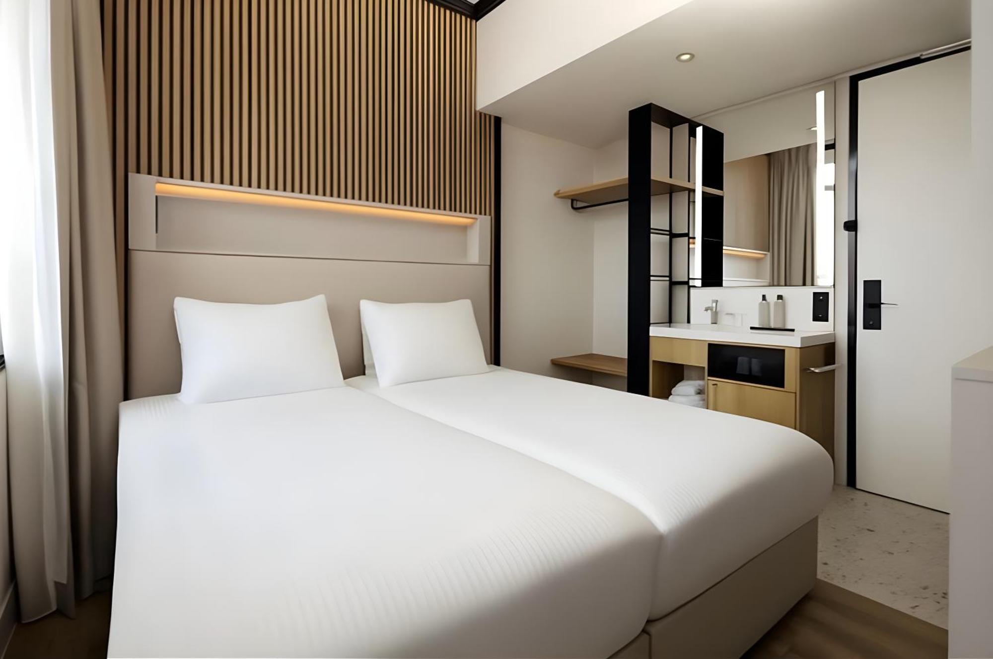 Kompaktes Zweibettzimmer