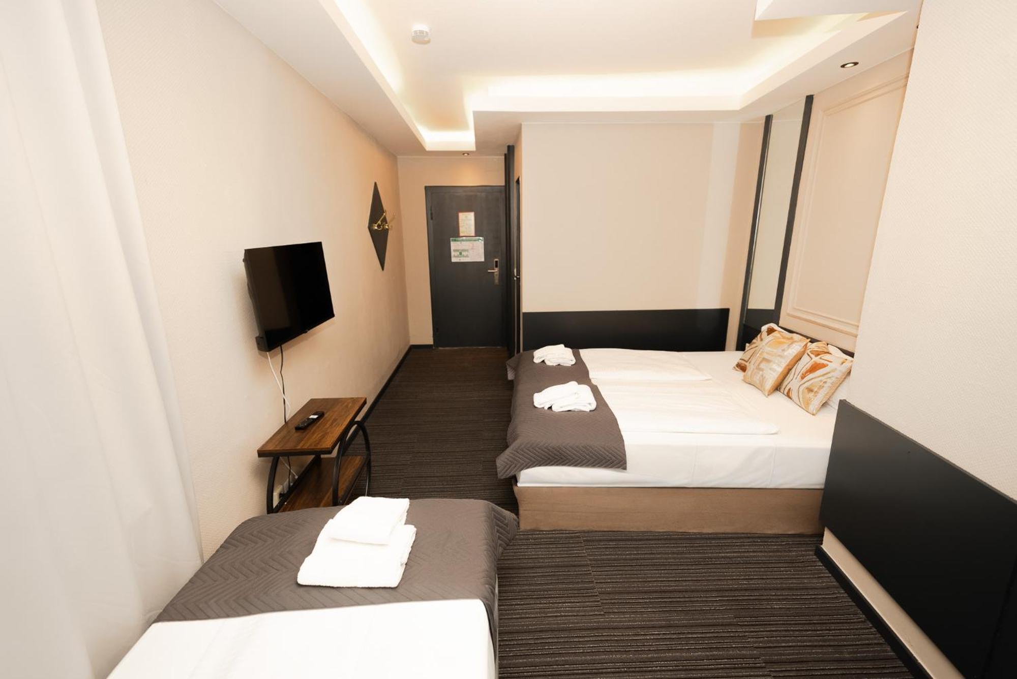 Dreibettzimmer
