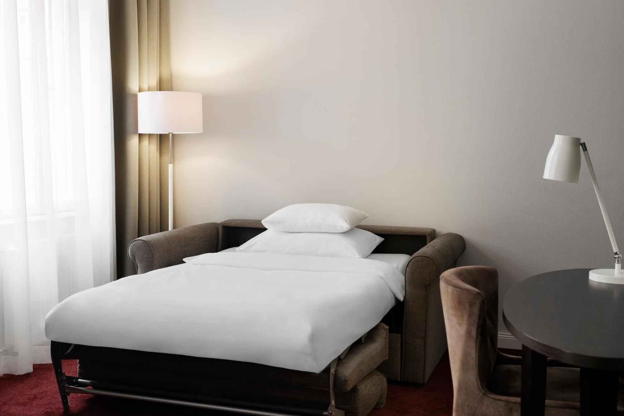 Deluxe Zimmer mit Kingsize-Bett und Schlafsofa